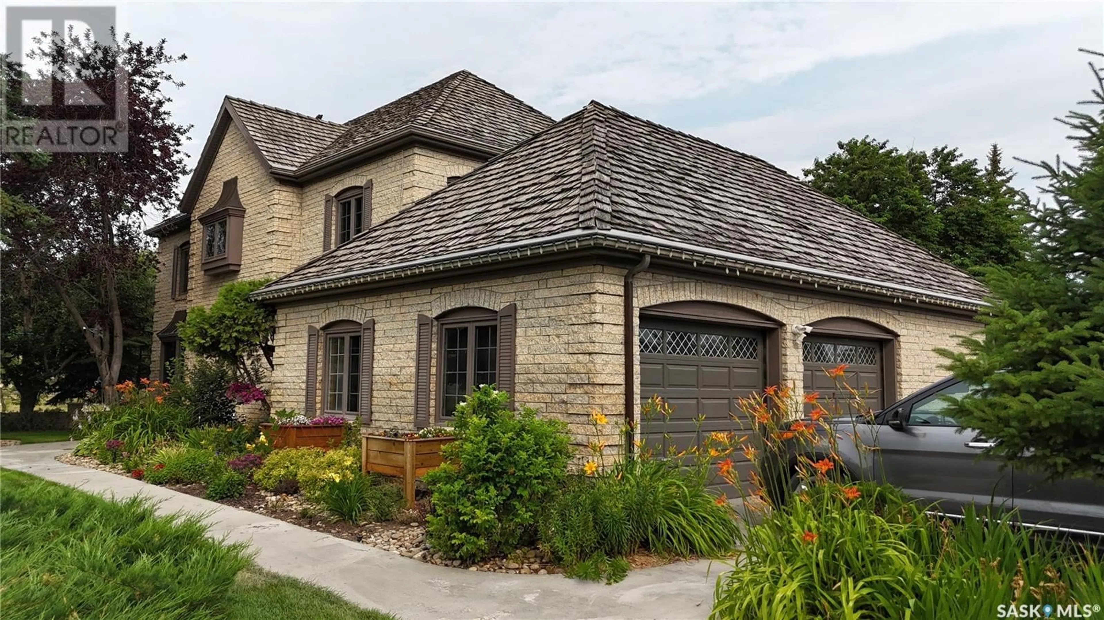 Home with brick exterior material, street for E - 777 GEORGE STREET, Swift Current Saskatchewan S9H1Z2
