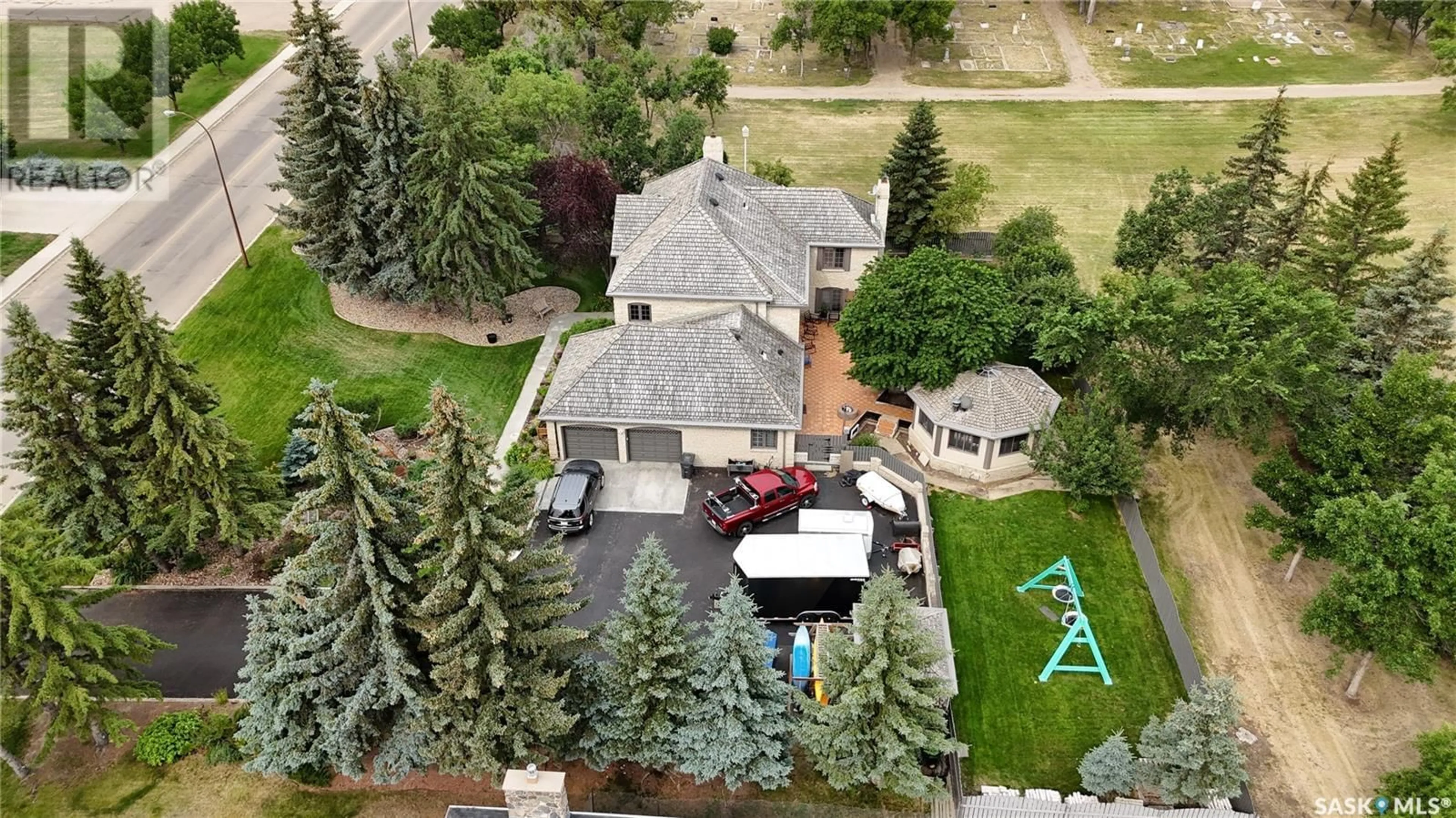 A pic from outside/outdoor area/front of a property/back of a property/a pic from drone, unknown for E - 777 GEORGE STREET, Swift Current Saskatchewan S9H1Z2