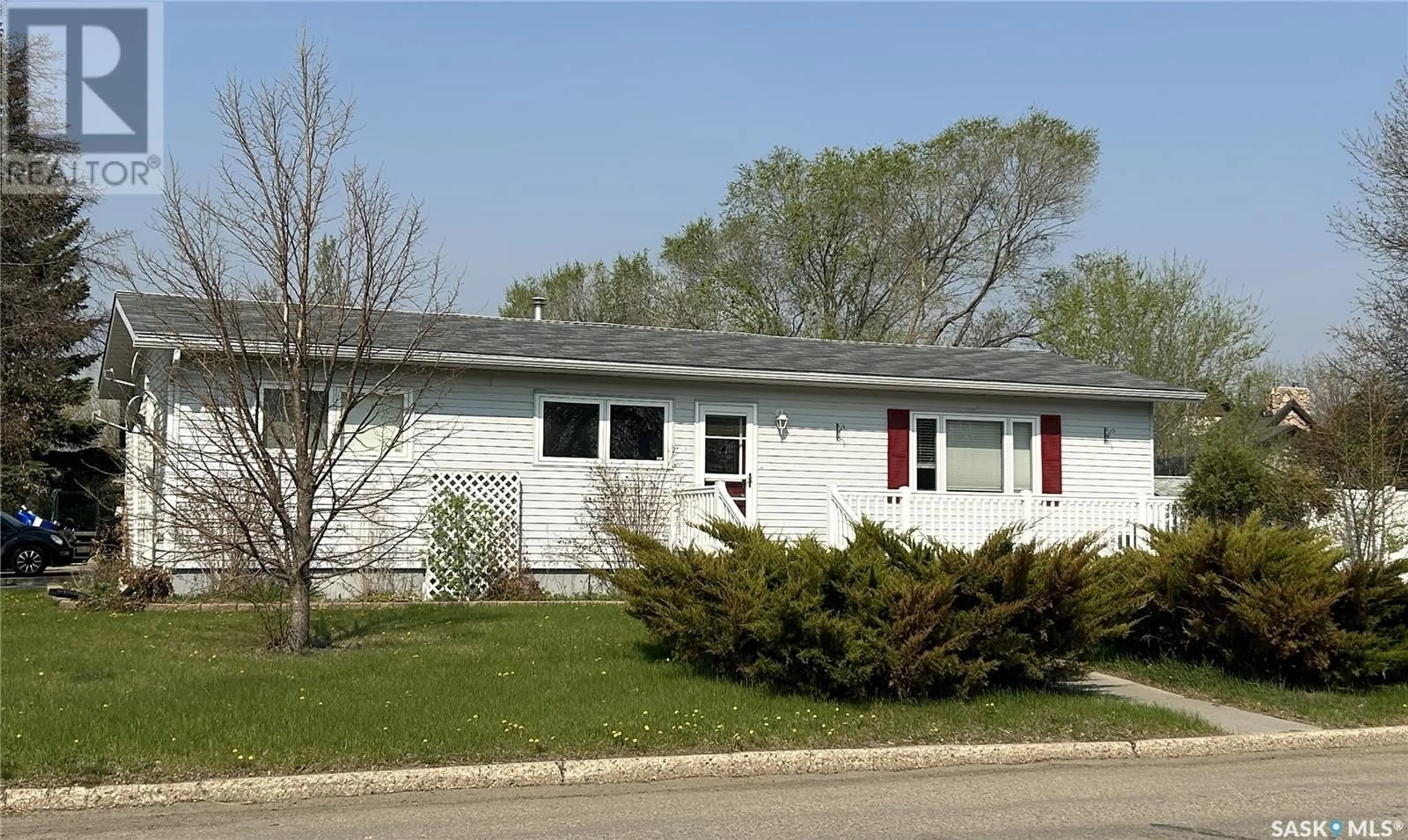 Home with vinyl exterior material, street for 1400 NICHOLSON ROAD, Estevan Saskatchewan S4A1T5
