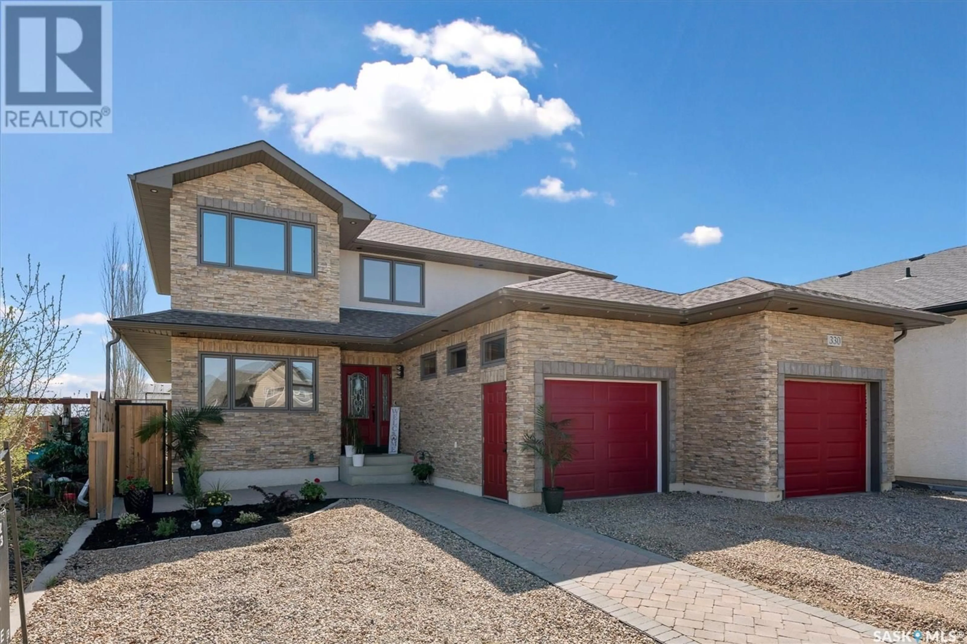 Home with brick exterior material, street for 330 GREENFIELD TERRACE, Saskatoon Saskatchewan S7R0B7