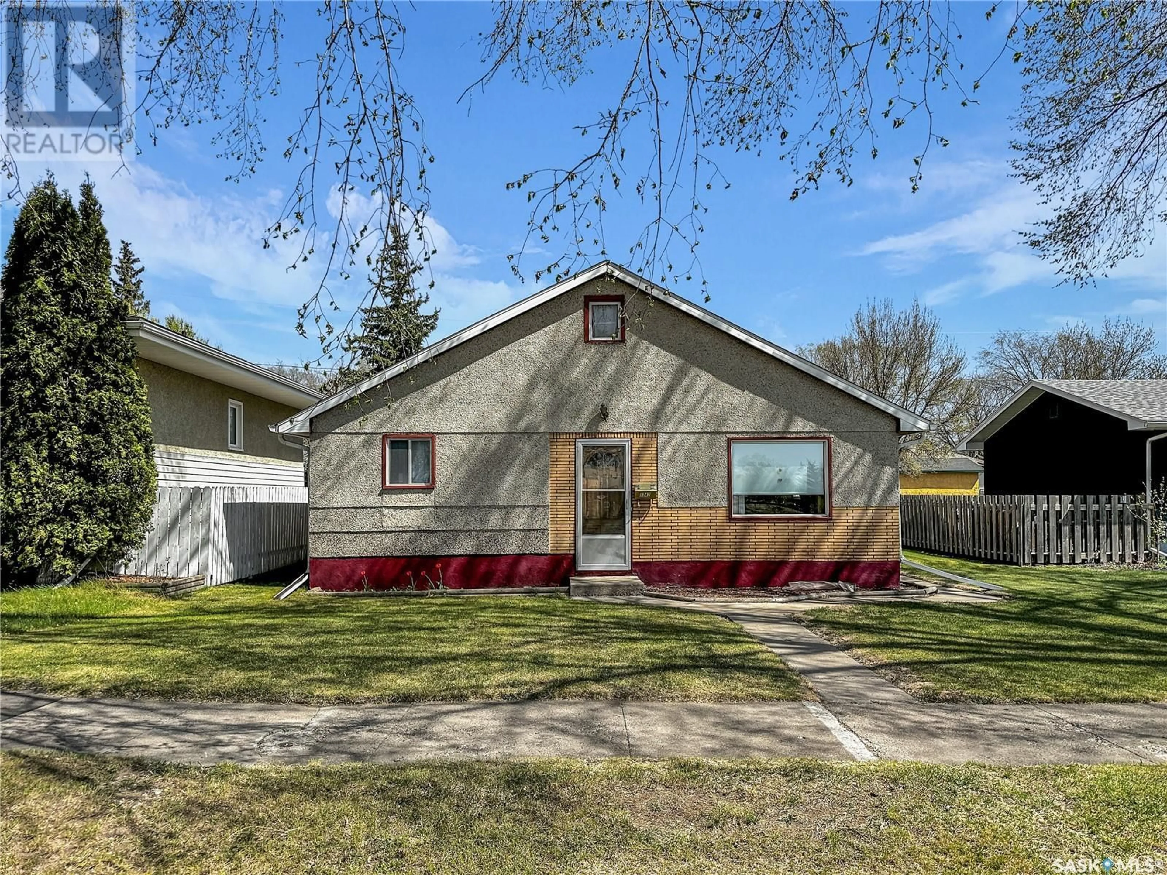 Home with vinyl exterior material, street for 1342 94TH STREET, North Battleford Saskatchewan S9A0E2