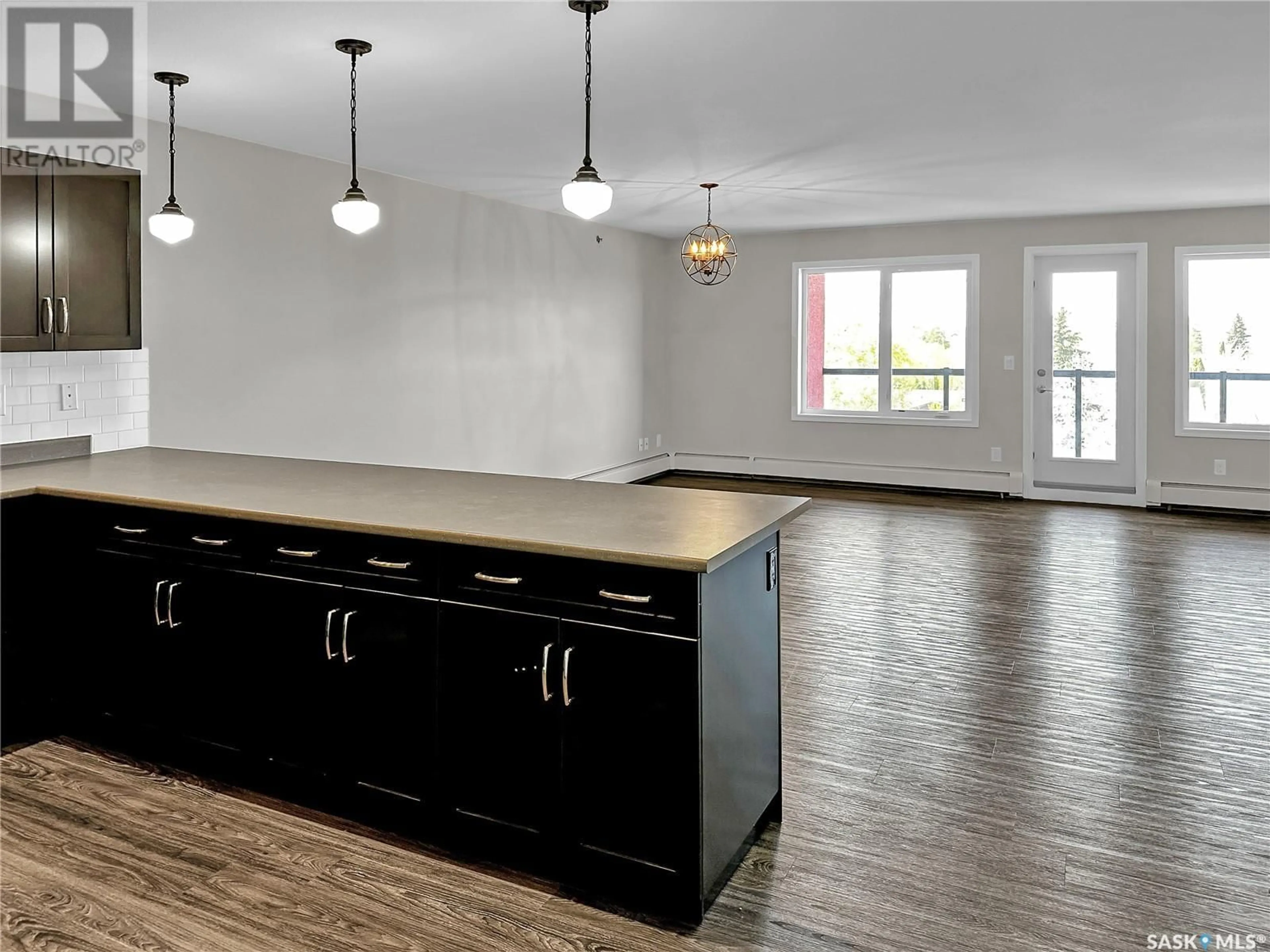 Open concept kitchen, unknown for 402 - 2452 KILLDEER DRIVE, North Battleford Saskatchewan S9A3T5
