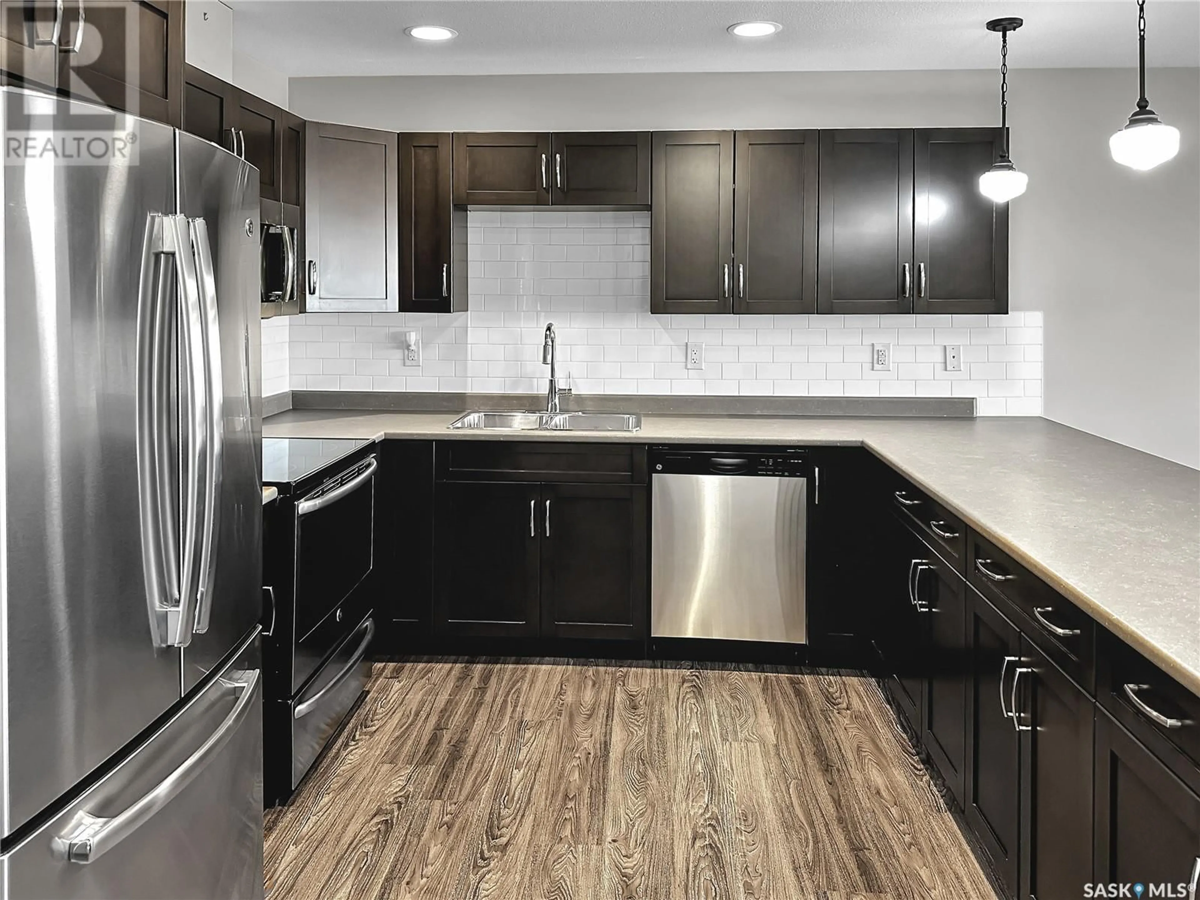 Open concept kitchen, unknown for 402 - 2452 KILLDEER DRIVE, North Battleford Saskatchewan S9A3T5