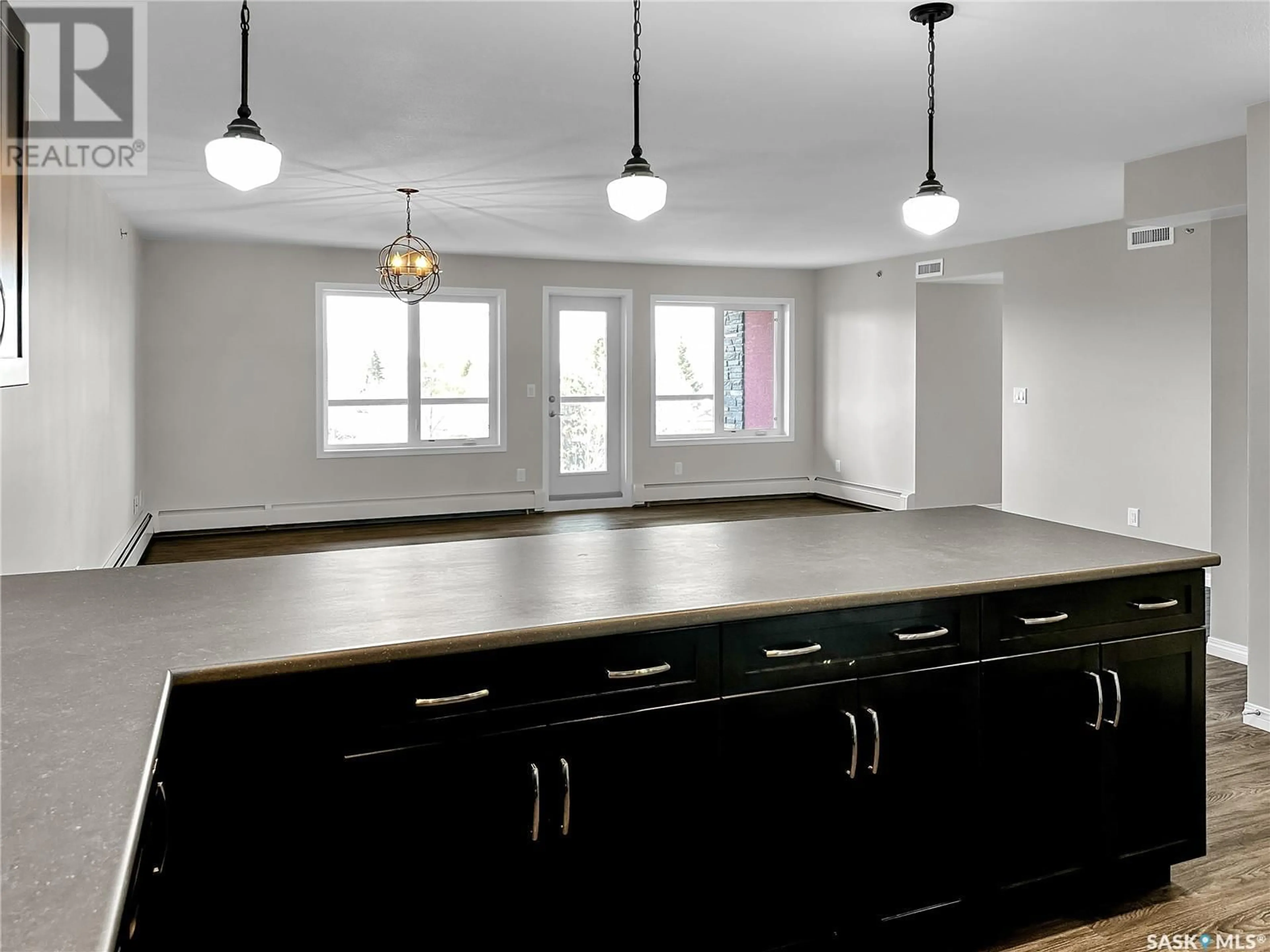 Open concept kitchen, unknown for 402 - 2452 KILLDEER DRIVE, North Battleford Saskatchewan S9A3T5