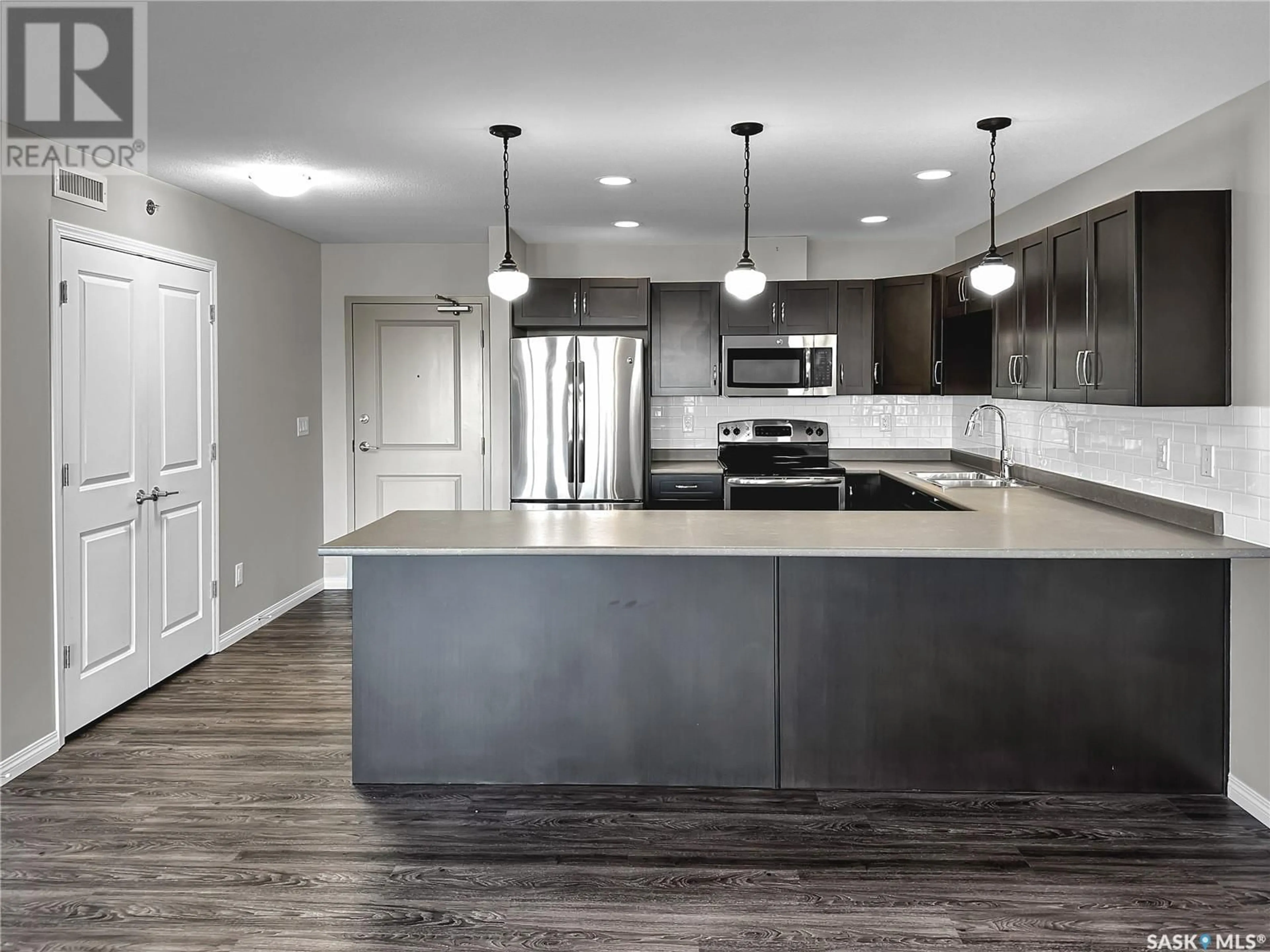 Open concept kitchen, unknown for 402 - 2452 KILLDEER DRIVE, North Battleford Saskatchewan S9A3T5