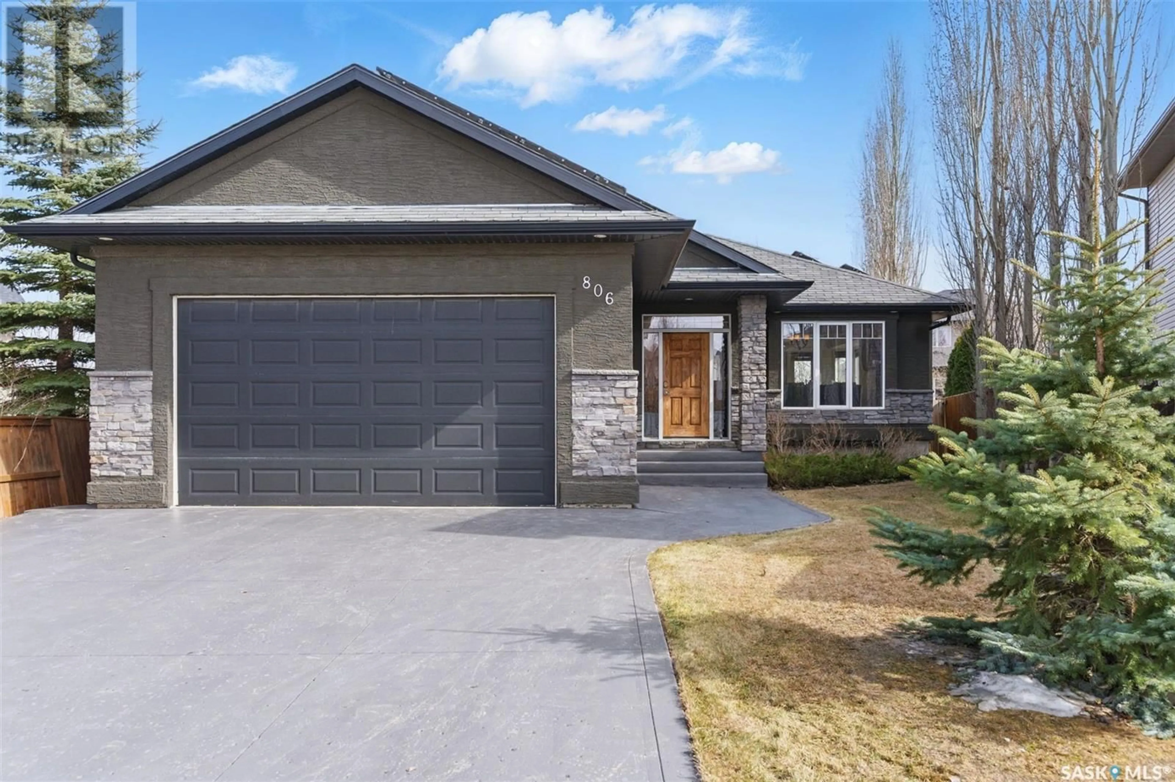 Home with brick exterior material, street for 806 WILKINS COURT, Saskatoon Saskatchewan S7W0C8