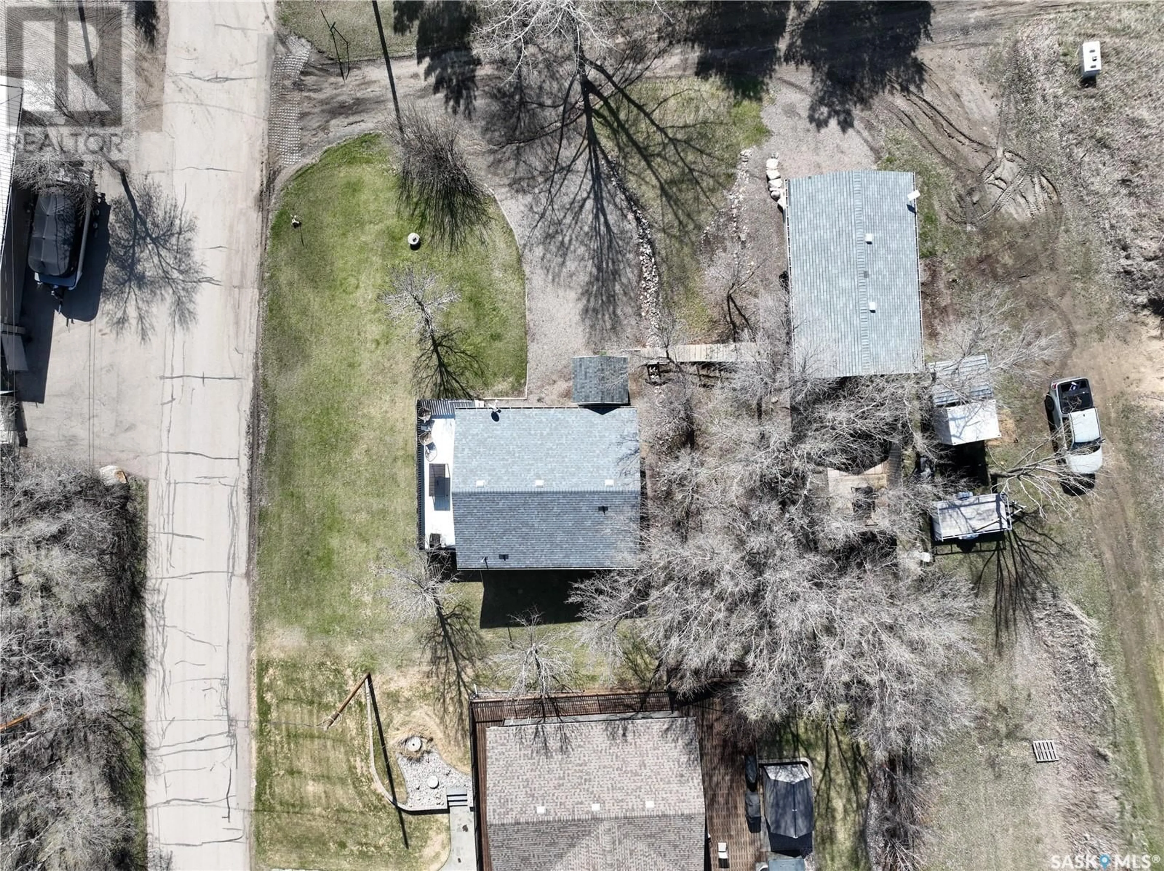 A pic from outside/outdoor area/front of a property/back of a property/a pic from drone, street for 509 TATANKA DRIVE, Marquis Rm No. 191 Saskatchewan S0G1P0