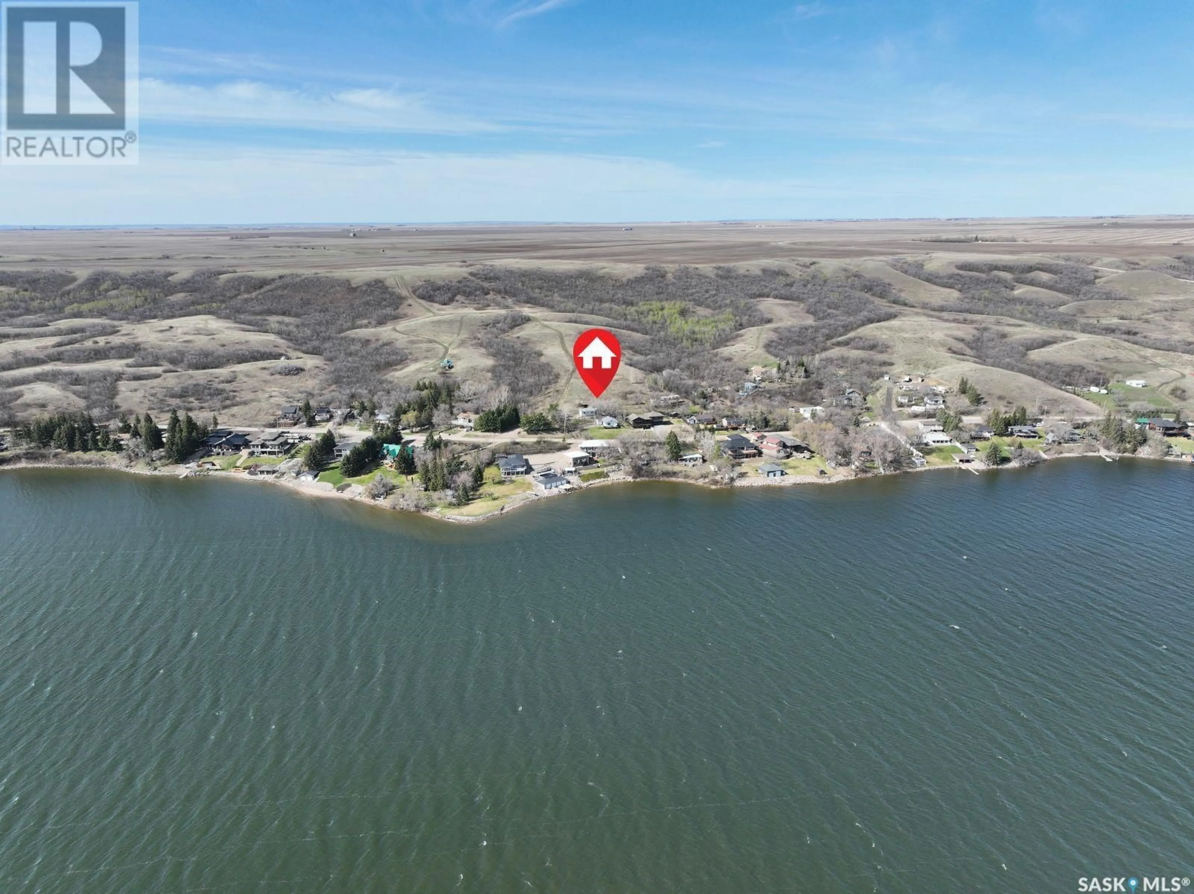 A pic from outside/outdoor area/front of a property/back of a property/a pic from drone, water/lake/river/ocean view for 509 TATANKA DRIVE, Marquis Rm No. 191 Saskatchewan S0G1P0