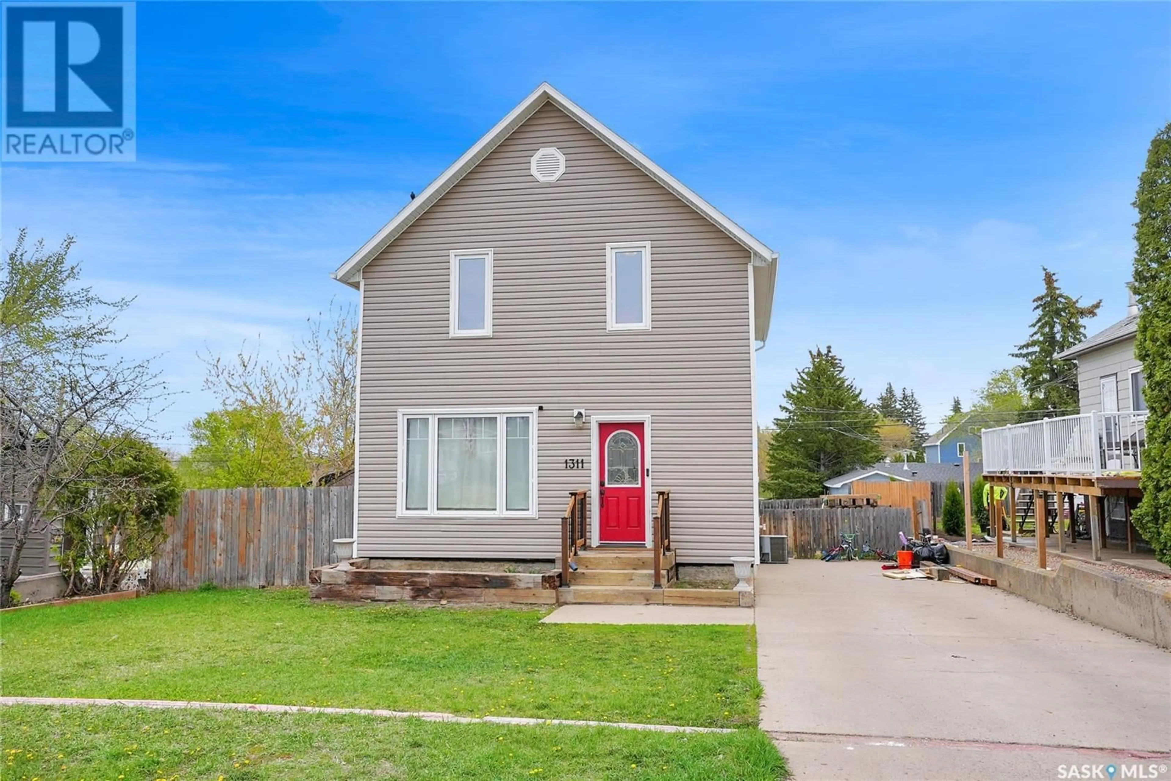 Home with vinyl exterior material, street for 1311 GRAFTON AVENUE, Moose Jaw Saskatchewan S6H3S9