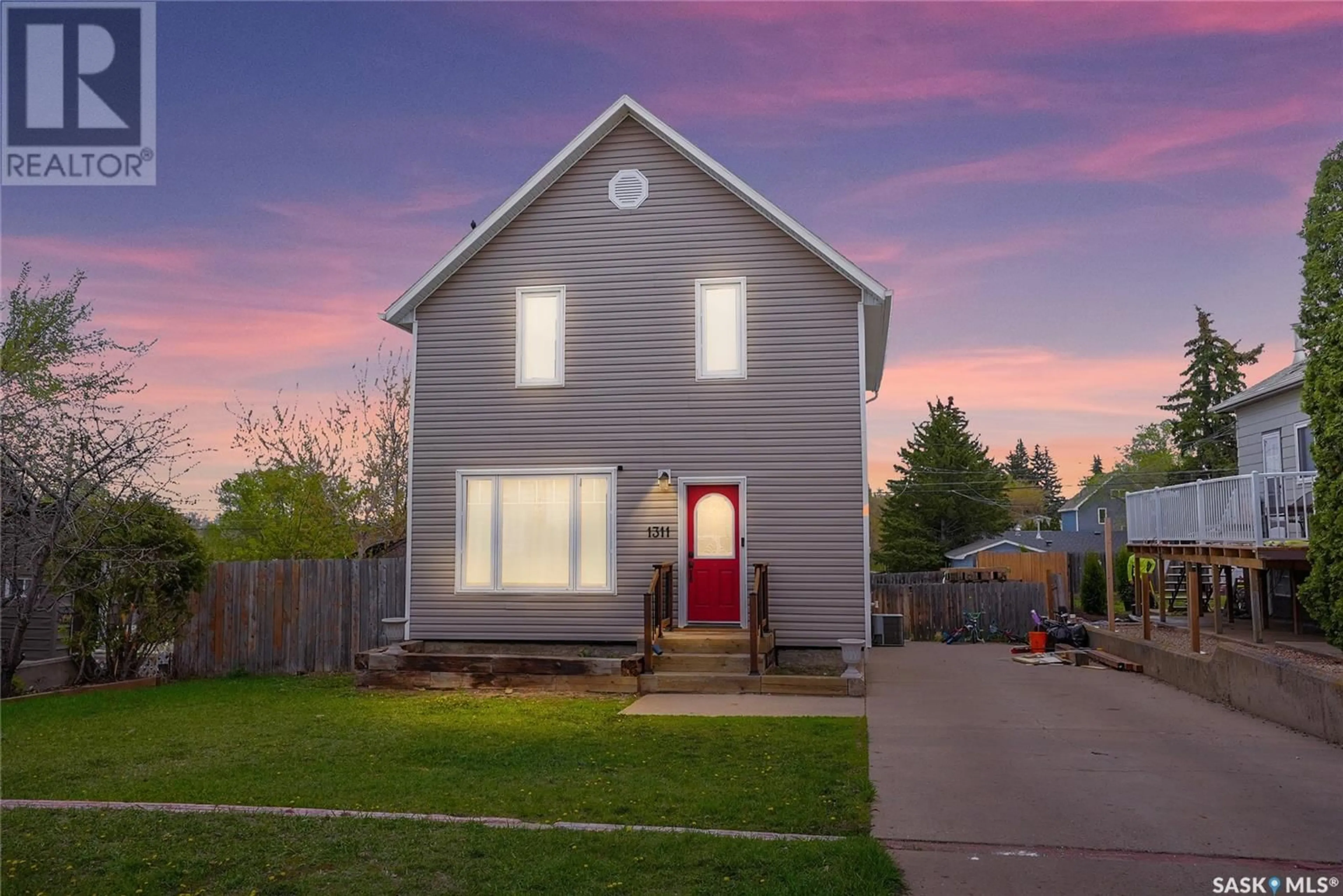 Home with vinyl exterior material, street for 1311 GRAFTON AVENUE, Moose Jaw Saskatchewan S6H3S9