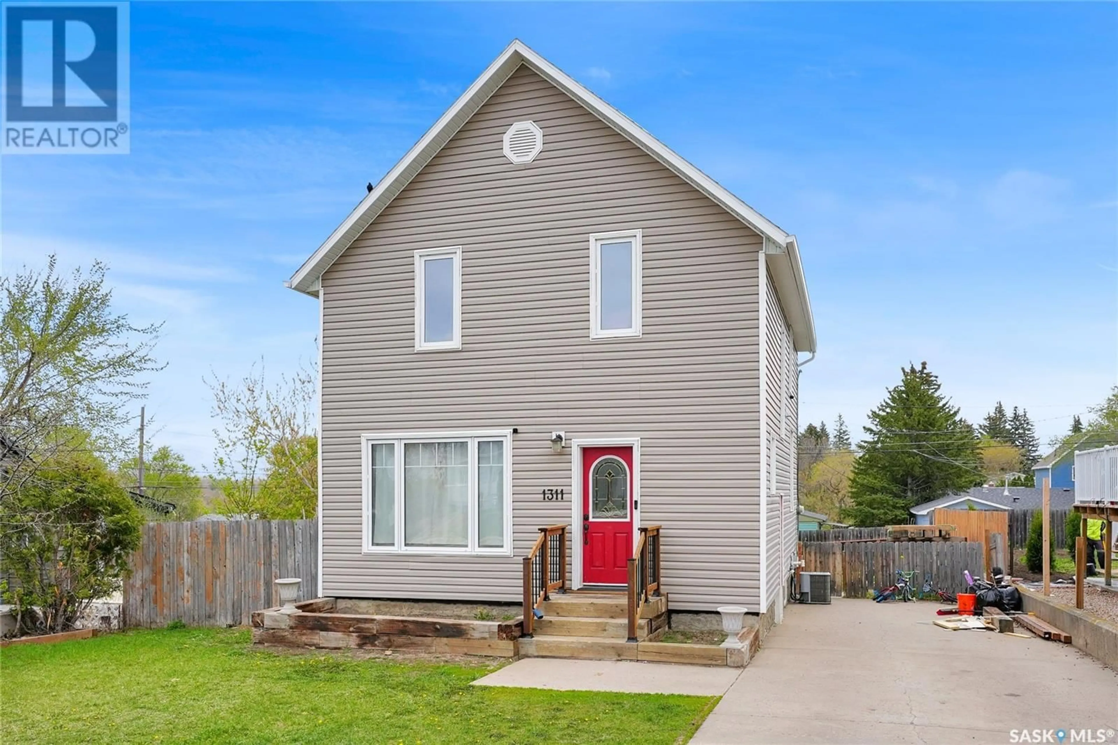 Home with vinyl exterior material, street for 1311 GRAFTON AVENUE, Moose Jaw Saskatchewan S6H3S9