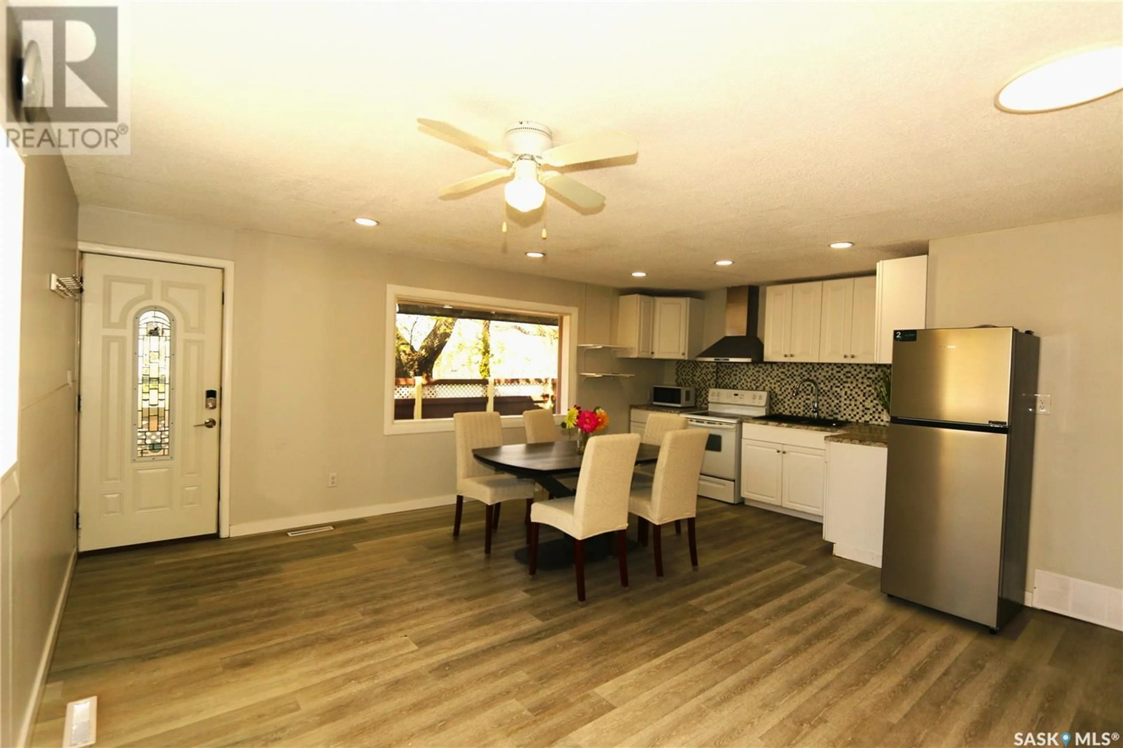 Open concept kitchen, wood/laminate floor for 271 BROAD STREET, Regina Saskatchewan S4R1X1