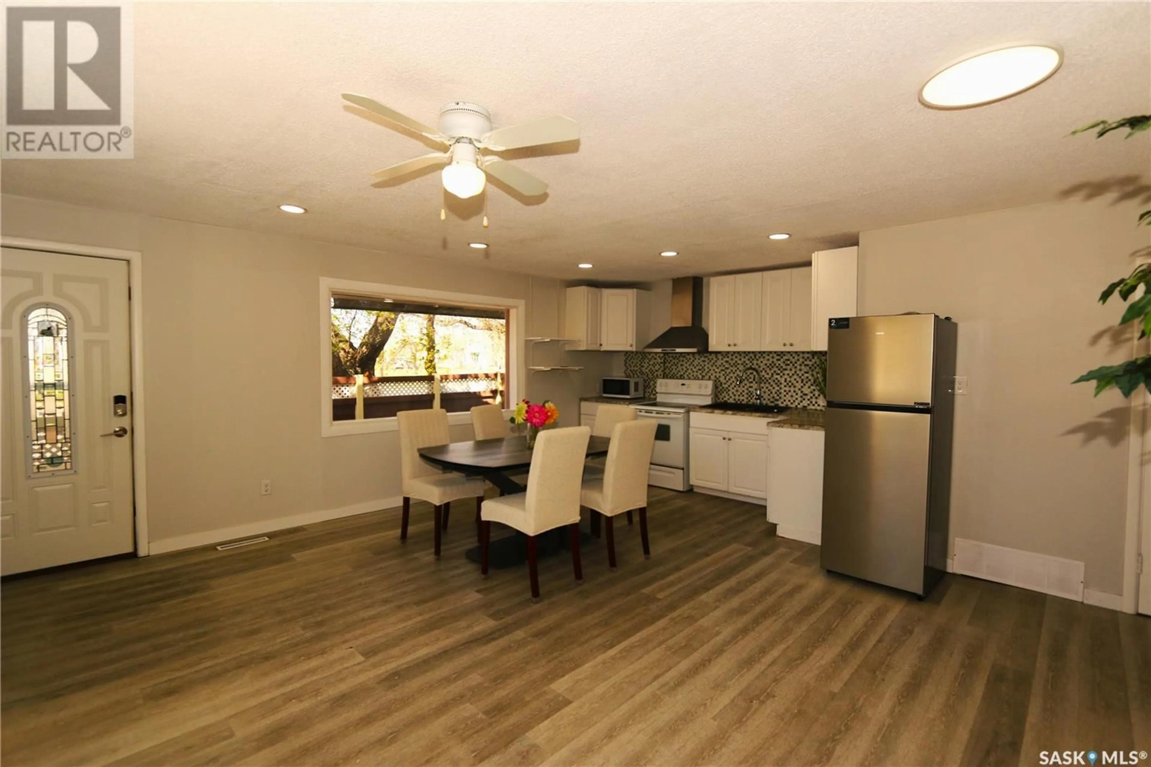 Open concept kitchen, wood/laminate floor for 271 BROAD STREET, Regina Saskatchewan S4R1X1