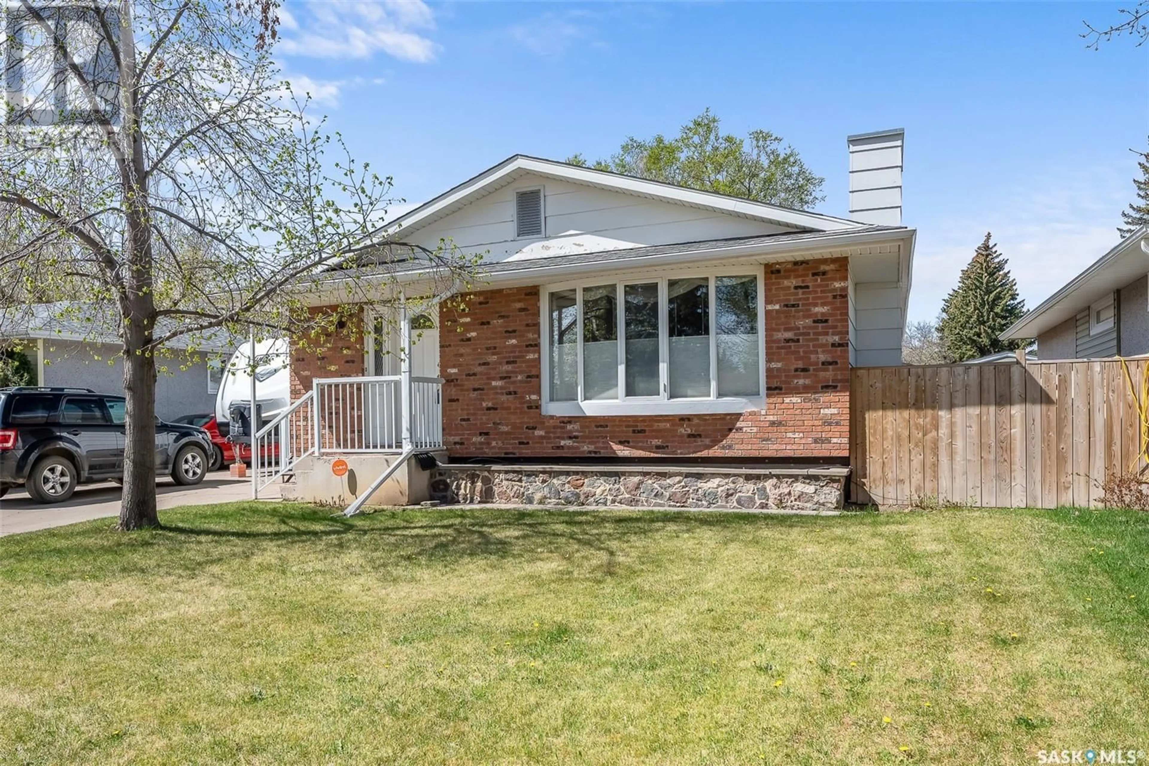 Home with brick exterior material, street for 1304 QUEEN CRESCENT, Moose Jaw Saskatchewan S6H3G4