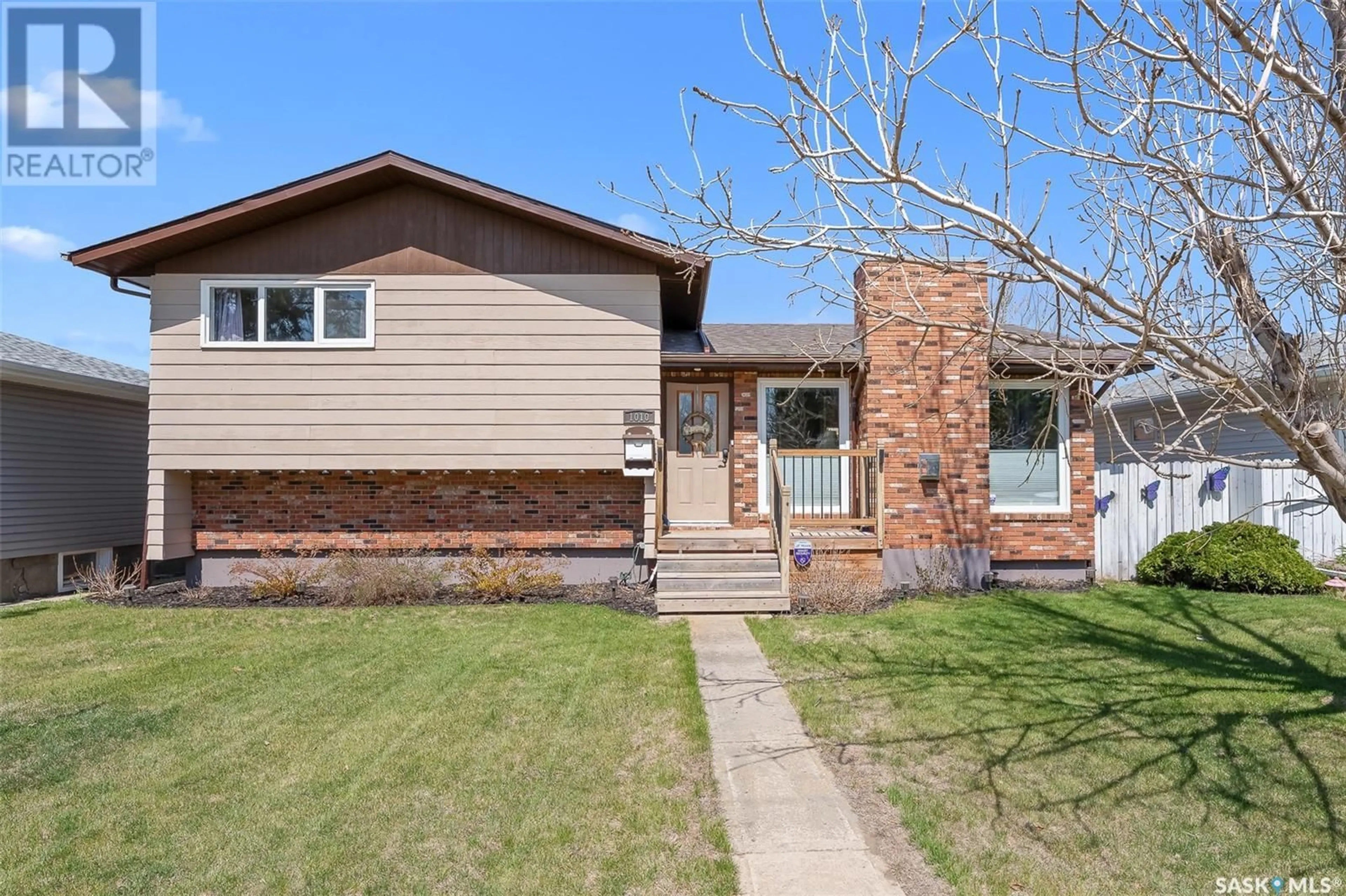 Home with brick exterior material, street for 1010 VAUGHAN STREET, Moose Jaw Saskatchewan S6H5P2