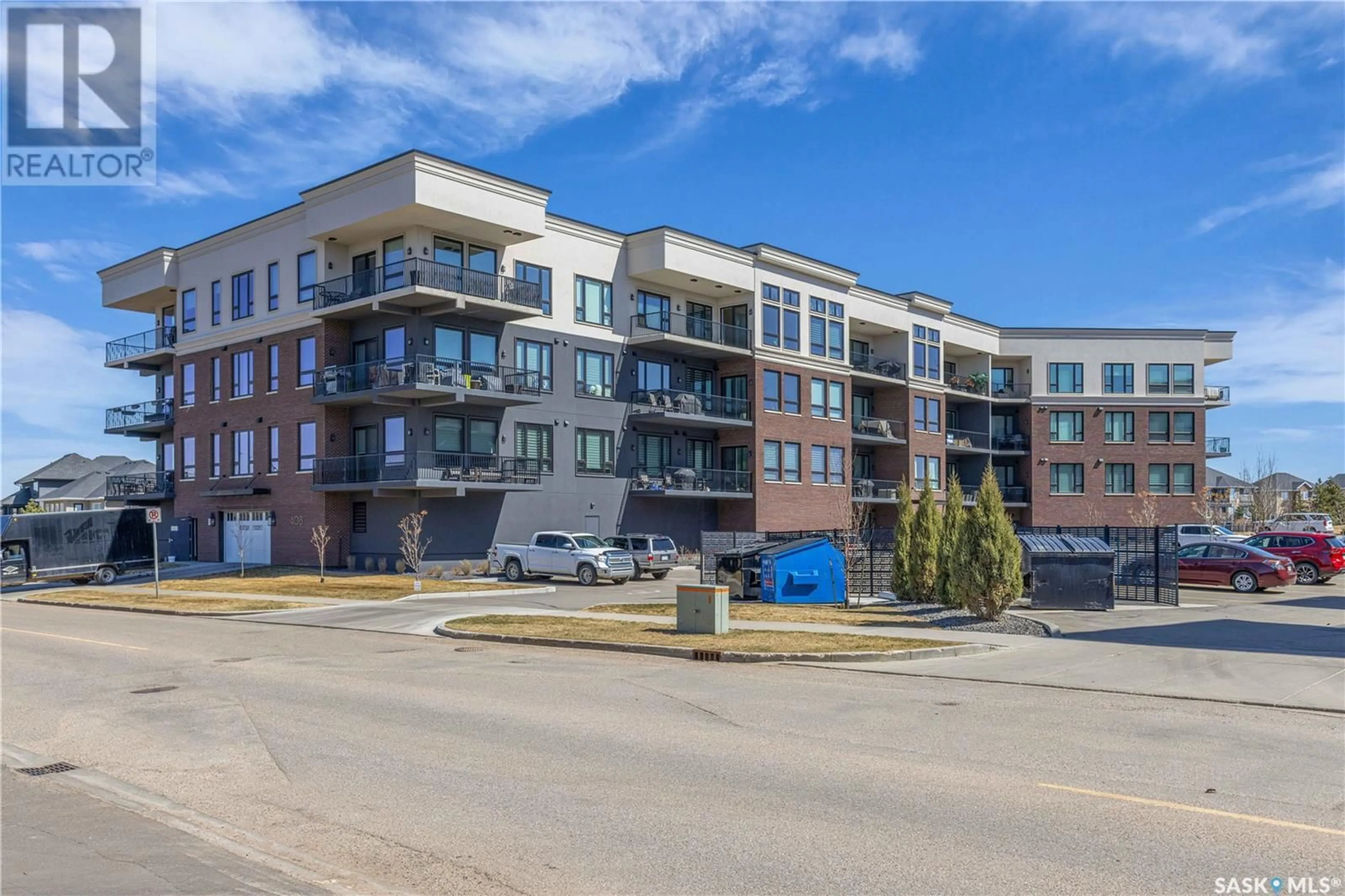 A pic from outside/outdoor area/front of a property/back of a property/a pic from drone, building for 210 408 CARTWRIGHT STREET, Saskatoon Saskatchewan S7T0X1