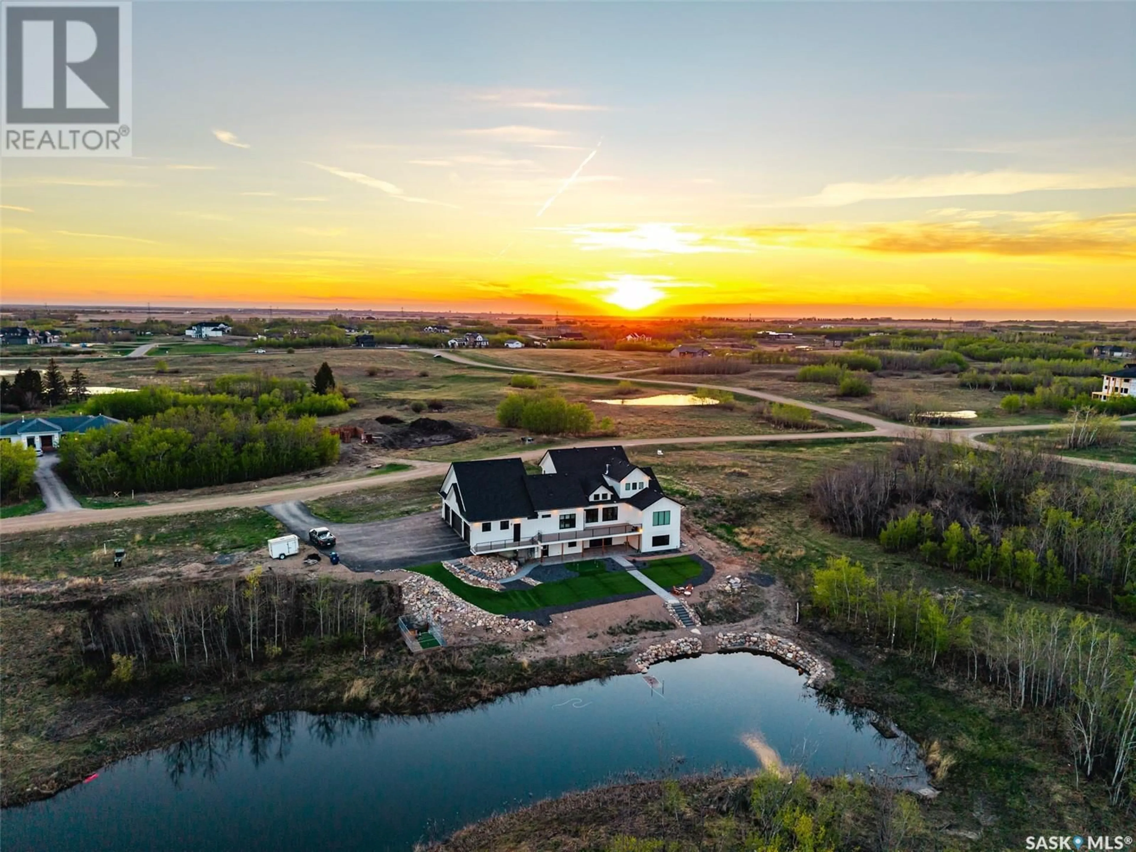 A pic from outside/outdoor area/front of a property/back of a property/a pic from drone, water/lake/river/ocean view for 43 APPLEWOOD COURT, Corman Park Rm No. 344 Saskatchewan S7V0X4