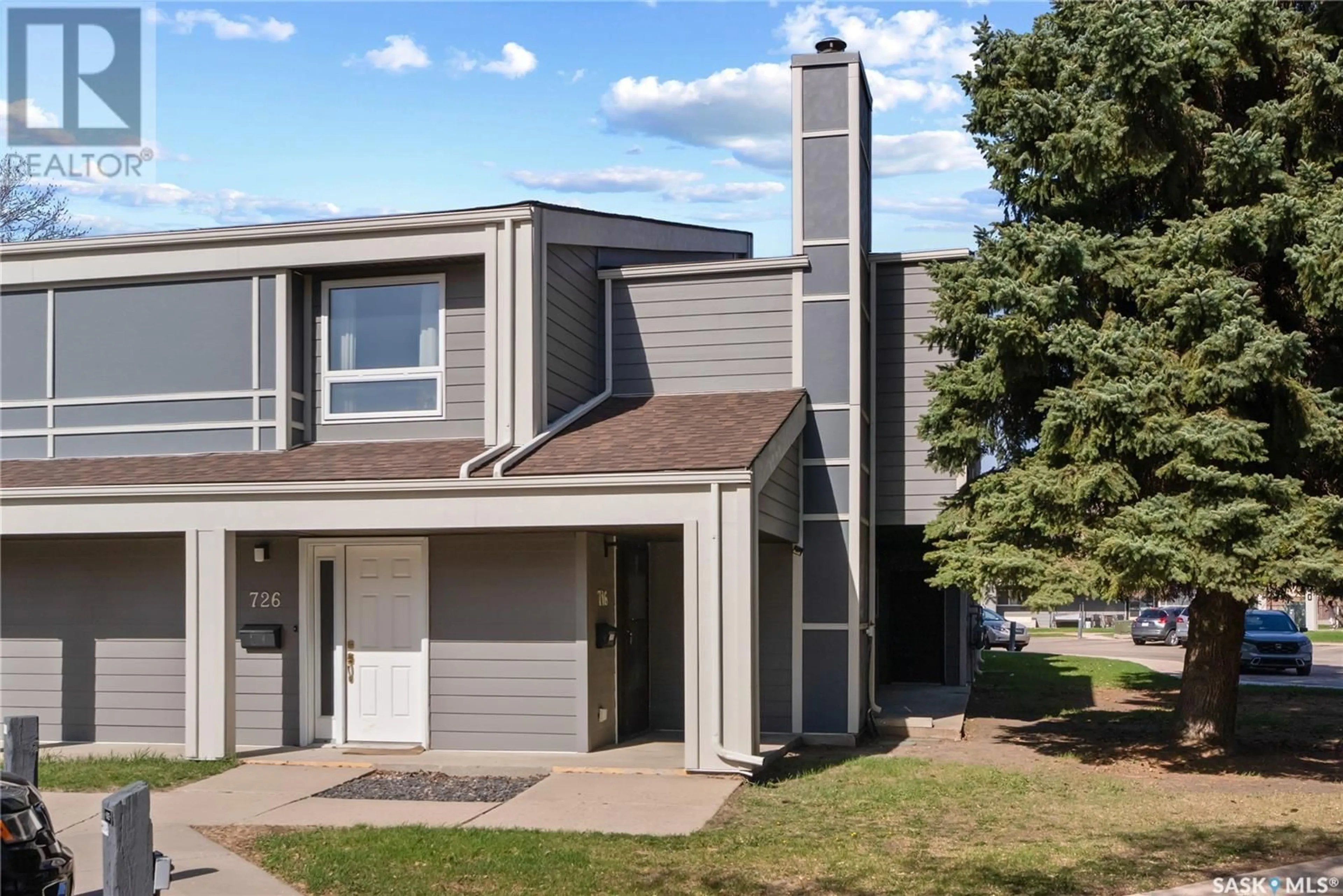 Home with vinyl exterior material, street for E - 716 425 115TH STREET, Saskatoon Saskatchewan S7N2E5