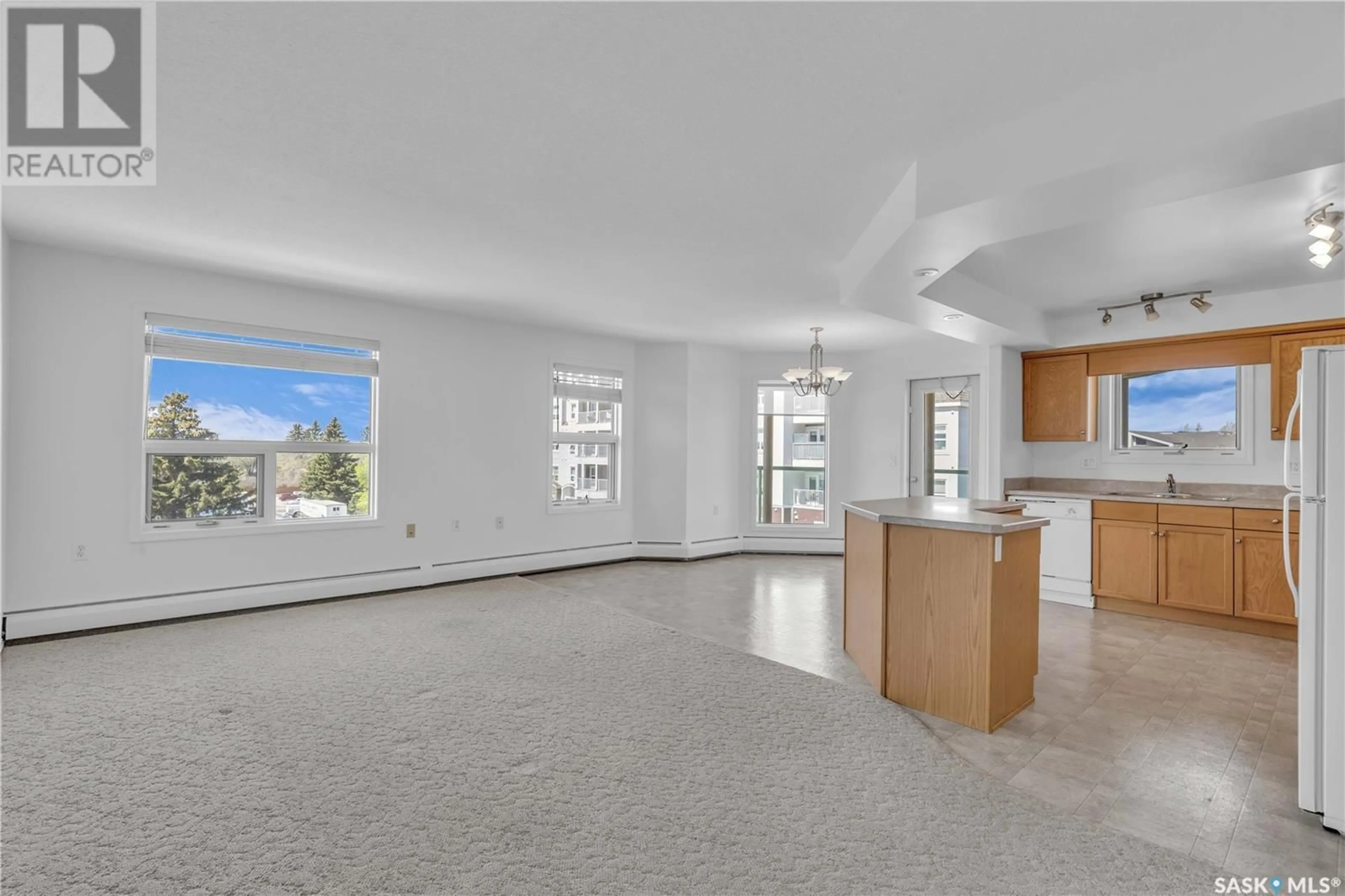 Open concept kitchen, unknown for 406 2213 ADELAIDE STREET E, Saskatoon Saskatchewan S7J0J6