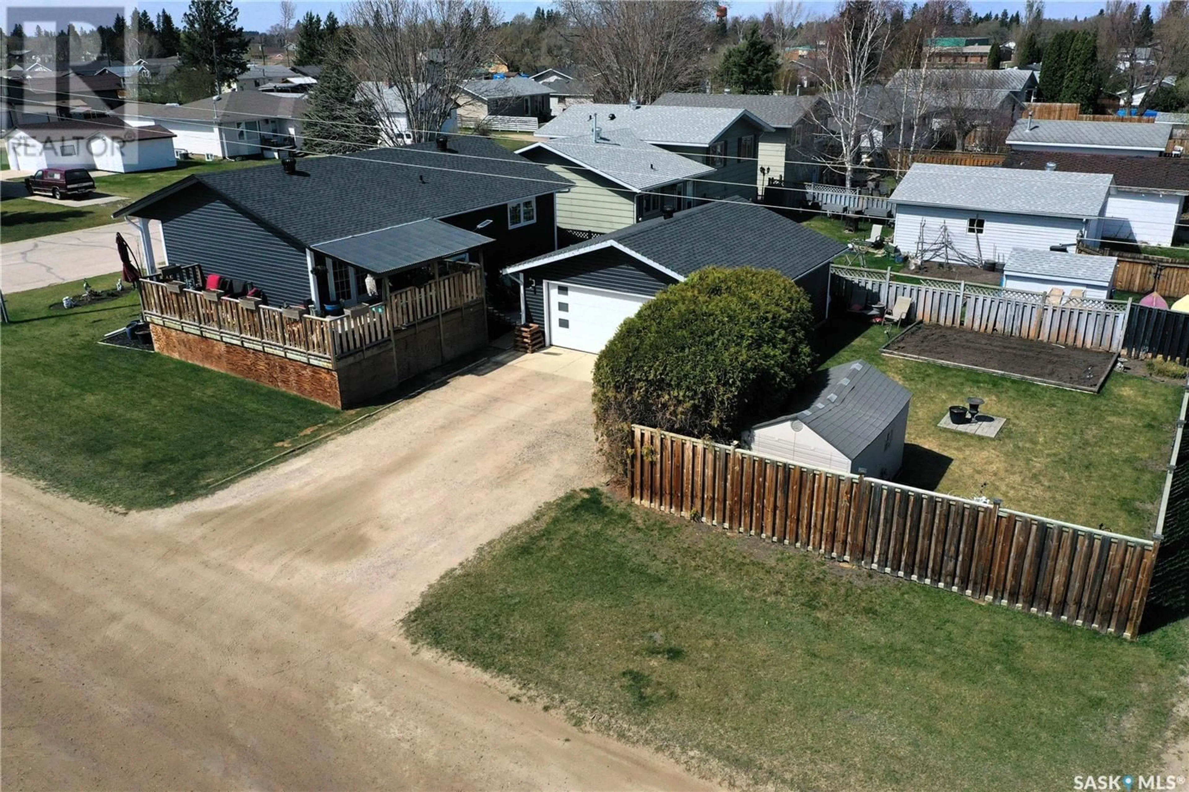 A pic from outside/outdoor area/front of a property/back of a property/a pic from drone, street for 1311 2ND STREET, Nipawin Saskatchewan S0E1E0