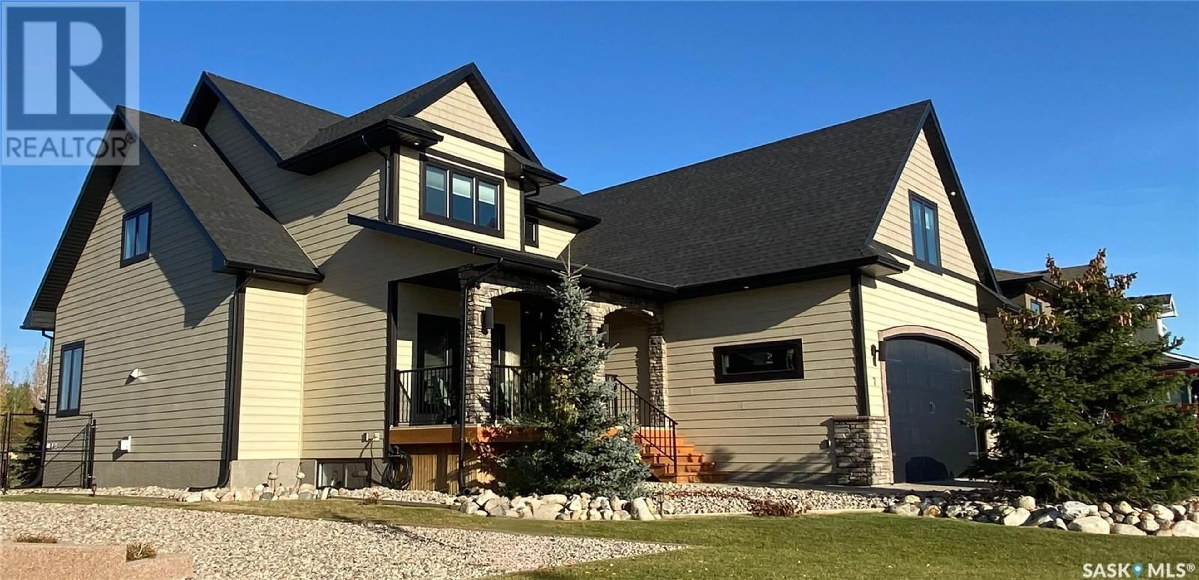 Home with vinyl exterior material, street for 7 STANFORD BAY, White City Saskatchewan S4L0C9