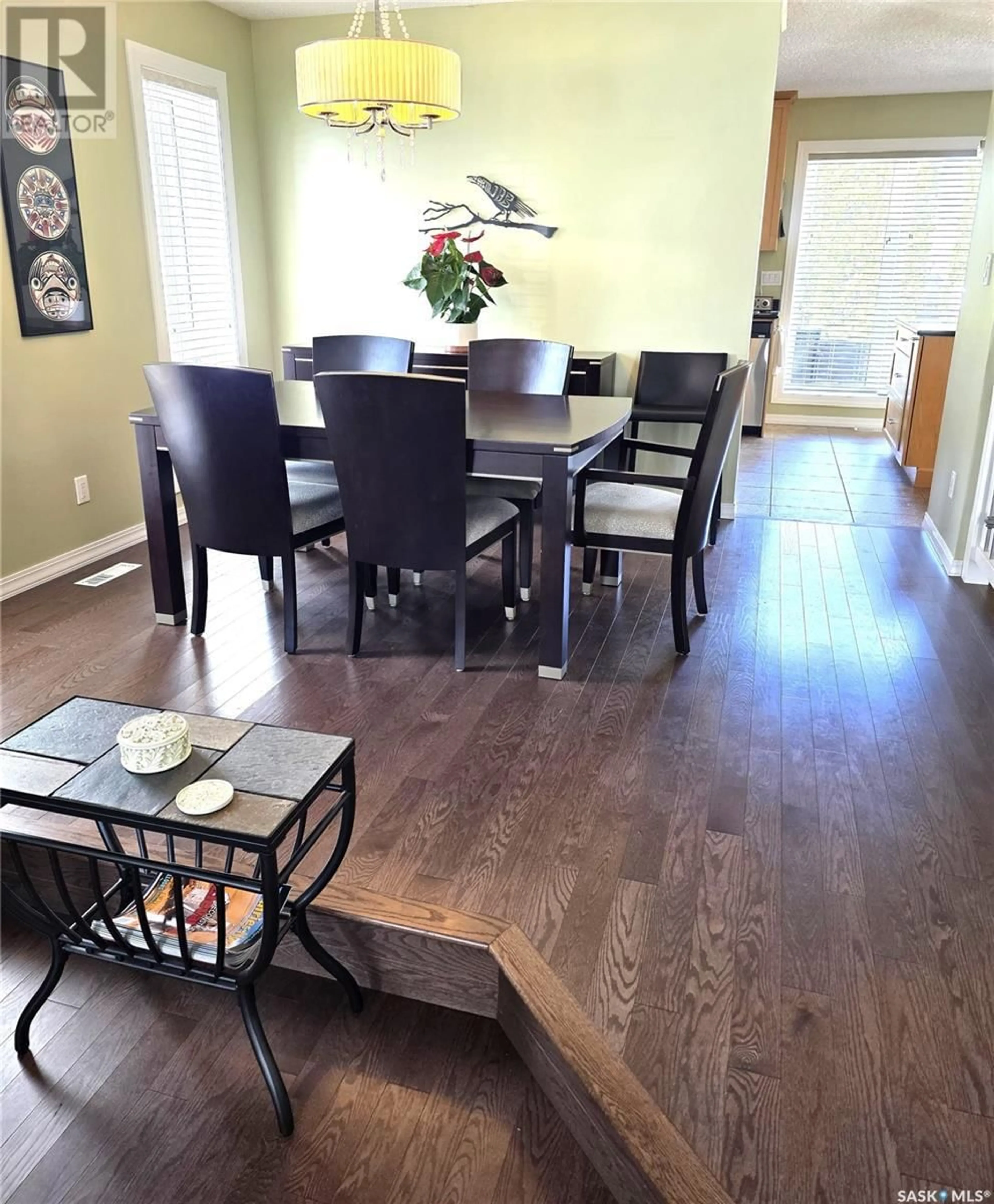 Dining room, wood/laminate floor for 251 GIRGULIS COURT, Saskatoon Saskatchewan S7K6X1