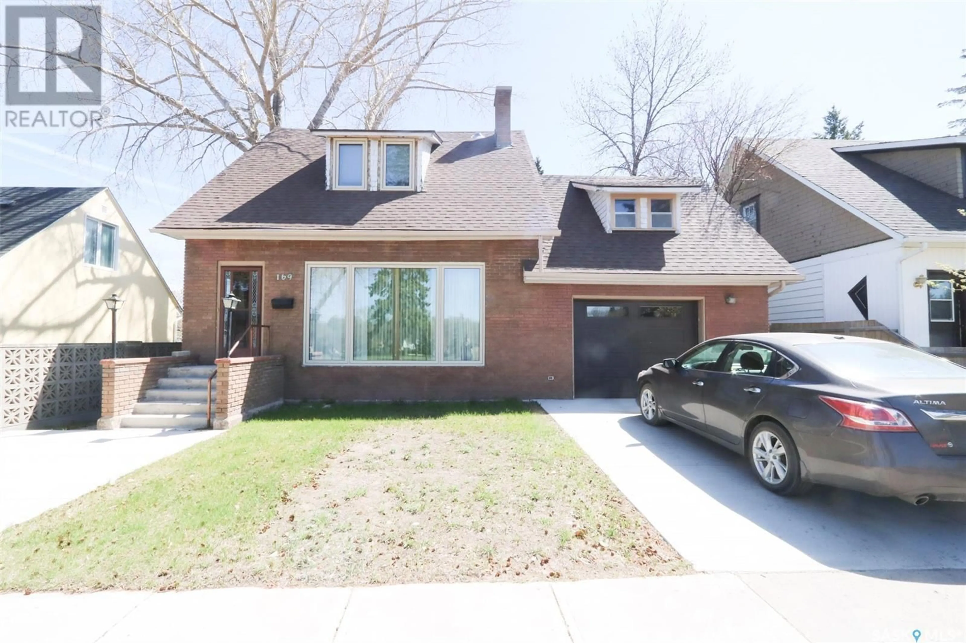 Home with brick exterior material, street for 169 ROSLYN AVENUE, Yorkton Saskatchewan S3N1P2