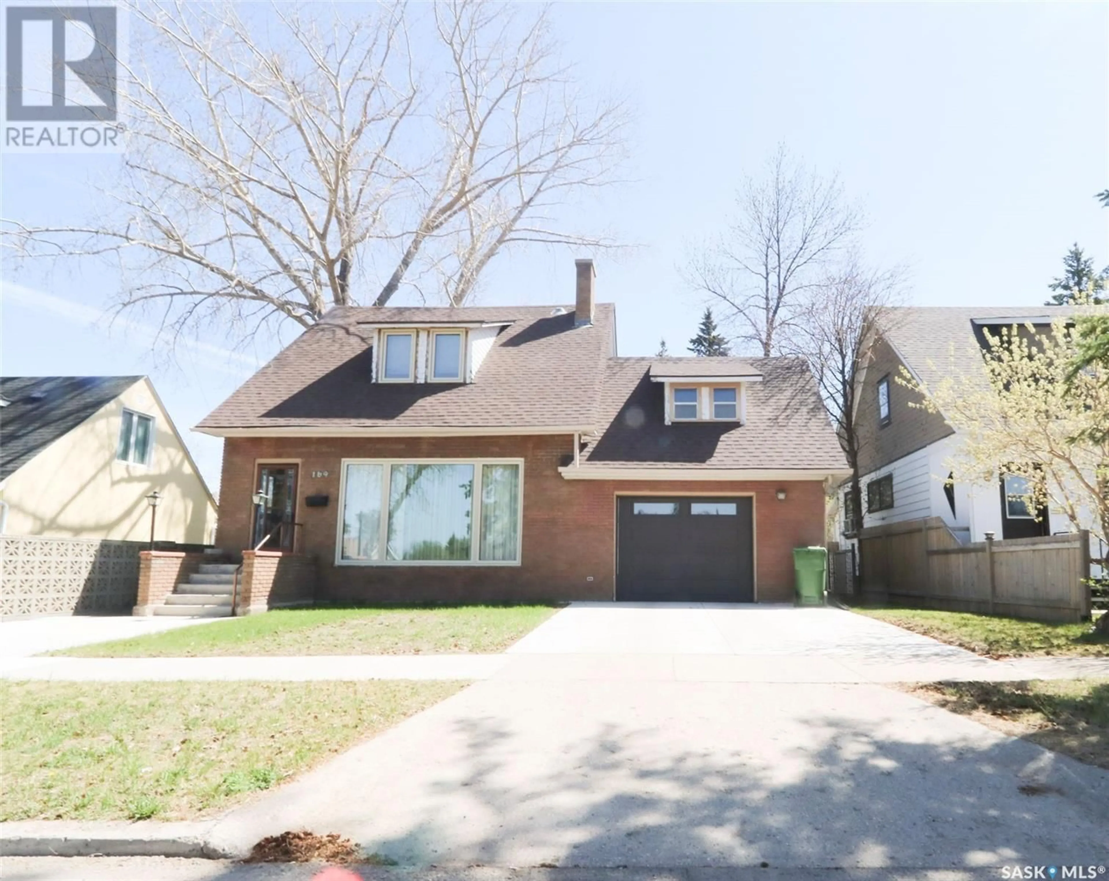 Home with brick exterior material, street for 169 ROSLYN AVENUE, Yorkton Saskatchewan S3N1P2