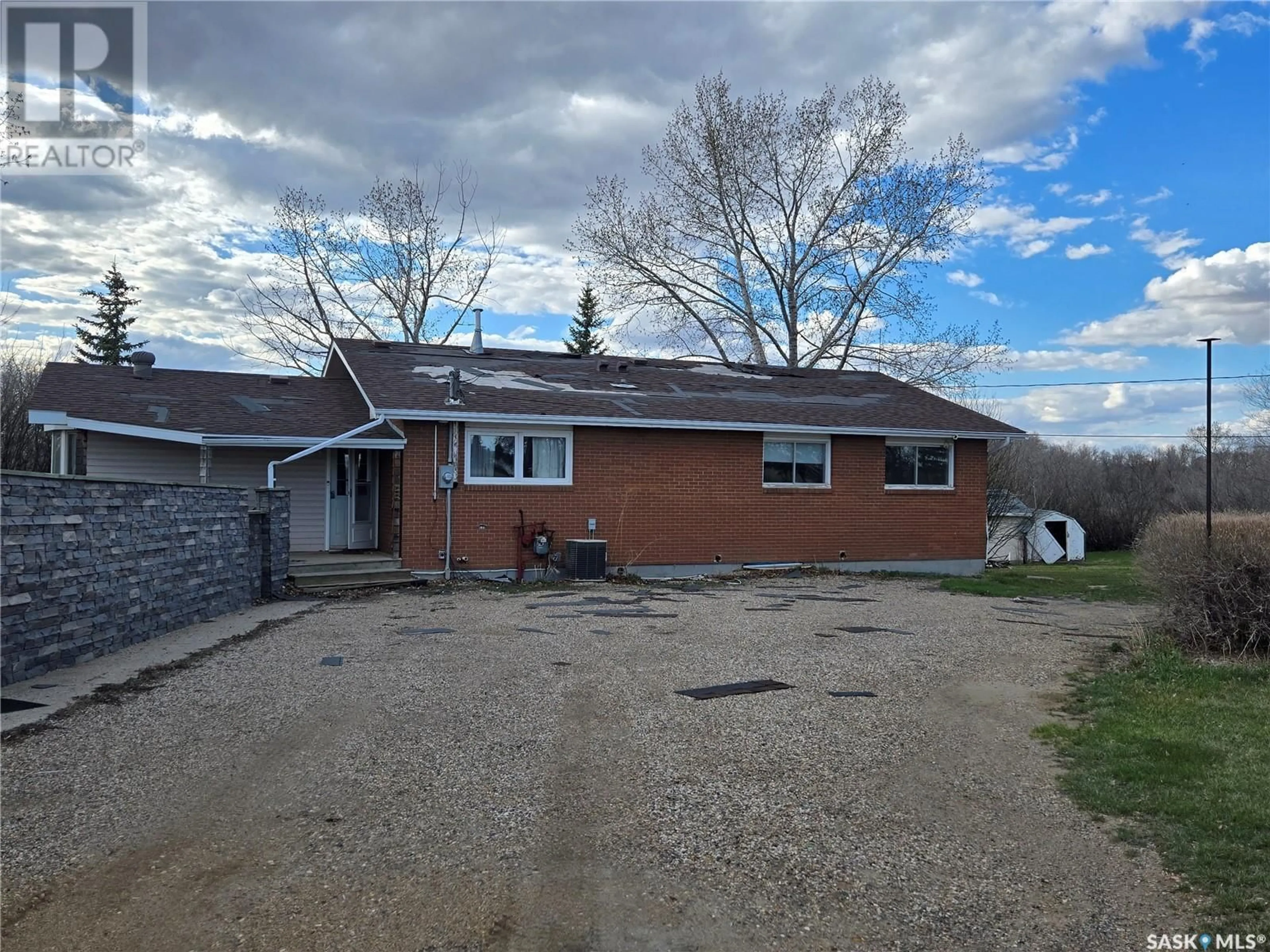 A pic from outside/outdoor area/front of a property/back of a property/a pic from drone, unknown for 901 QUEEN STREET, Estevan Saskatchewan S4A2A1
