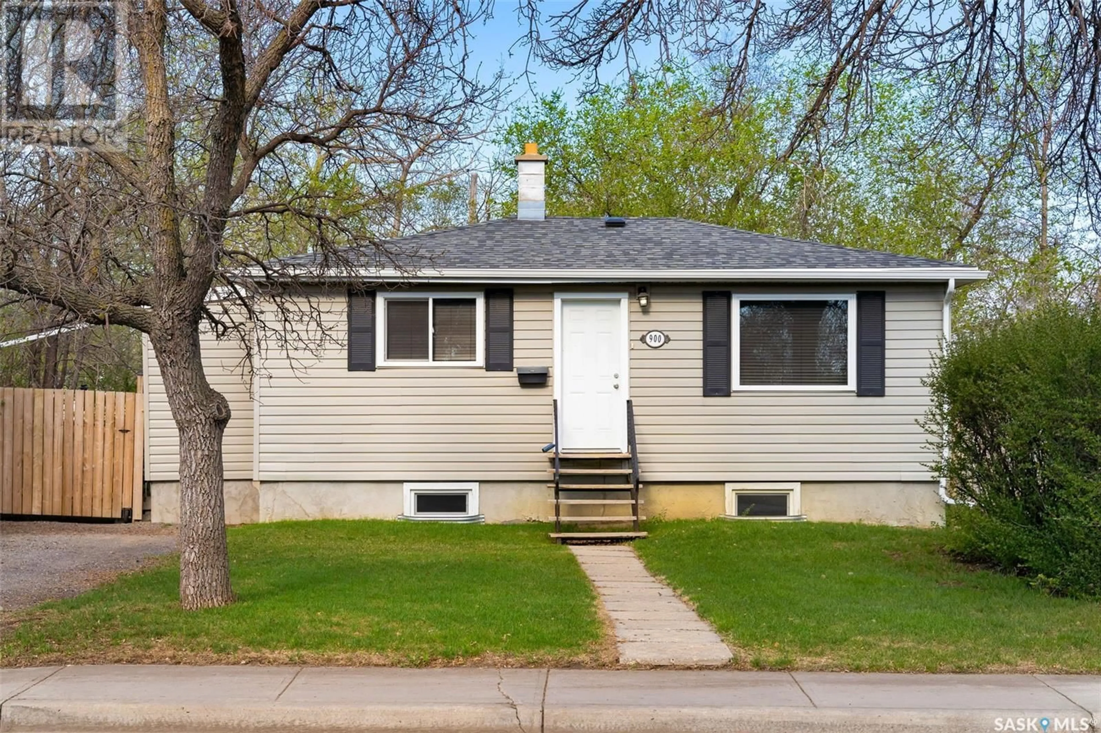 Home with vinyl exterior material, street for 900 FORGET STREET, Regina Saskatchewan S4T4X6