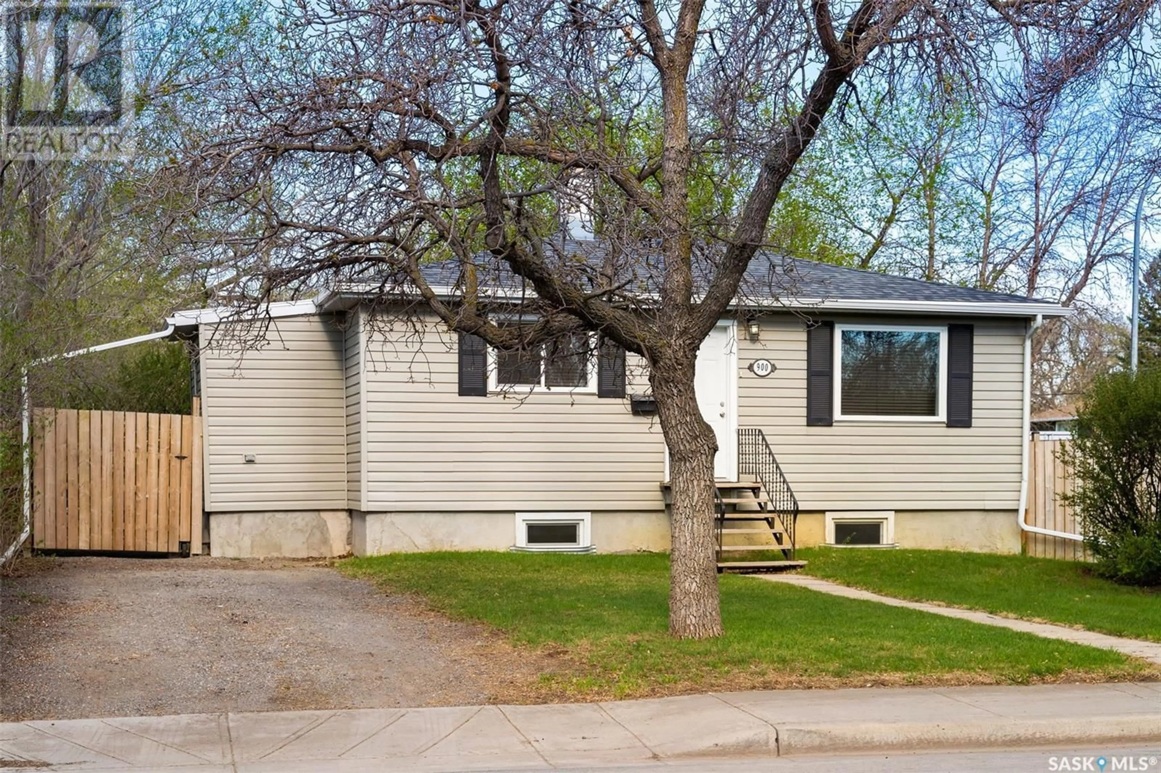 Home with vinyl exterior material, street for 900 FORGET STREET, Regina Saskatchewan S4T4X6