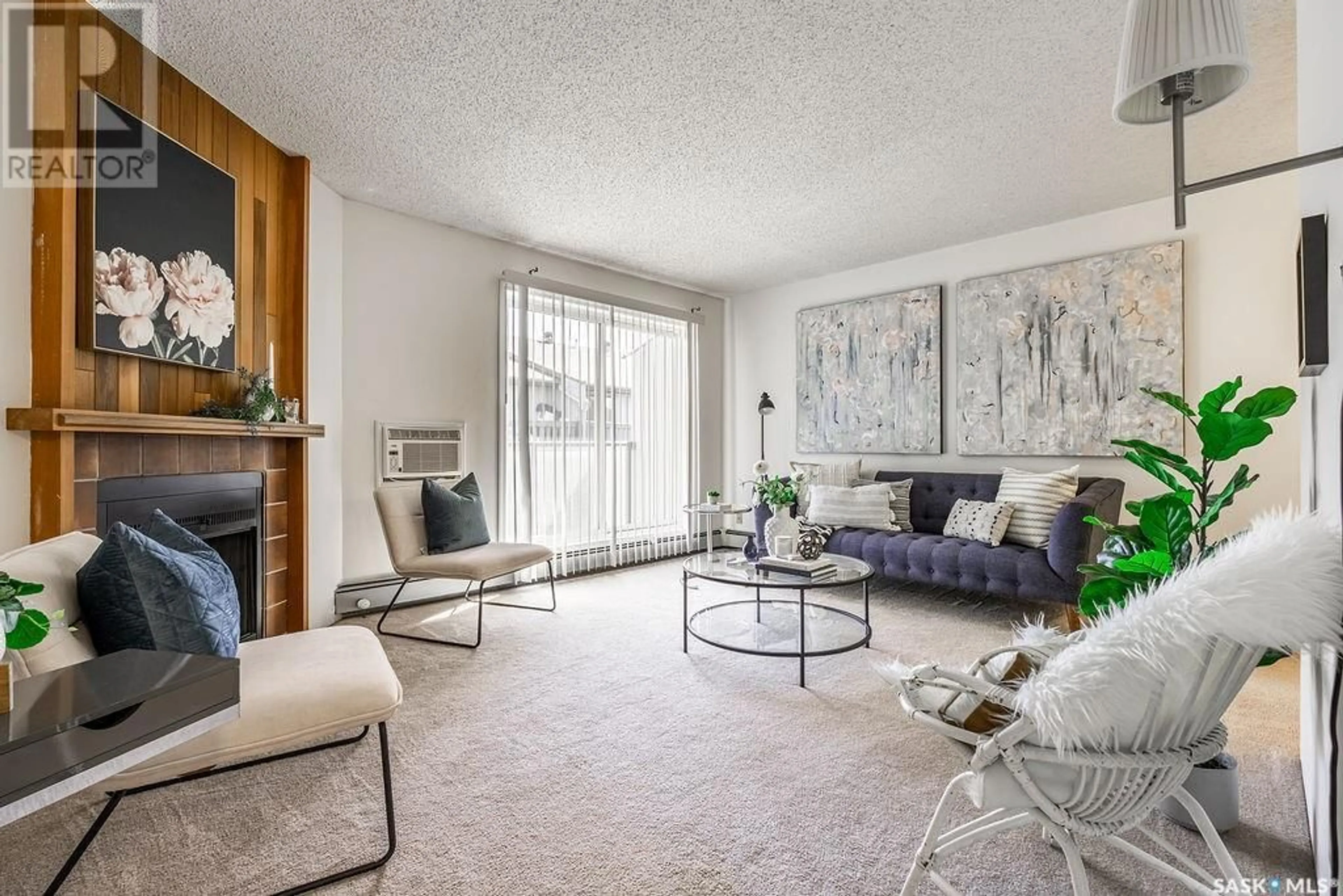 Living room with furniture, carpet floor for 833 - 303 WOLLASTON CRESCENT, Saskatoon Saskatchewan S7J4G1