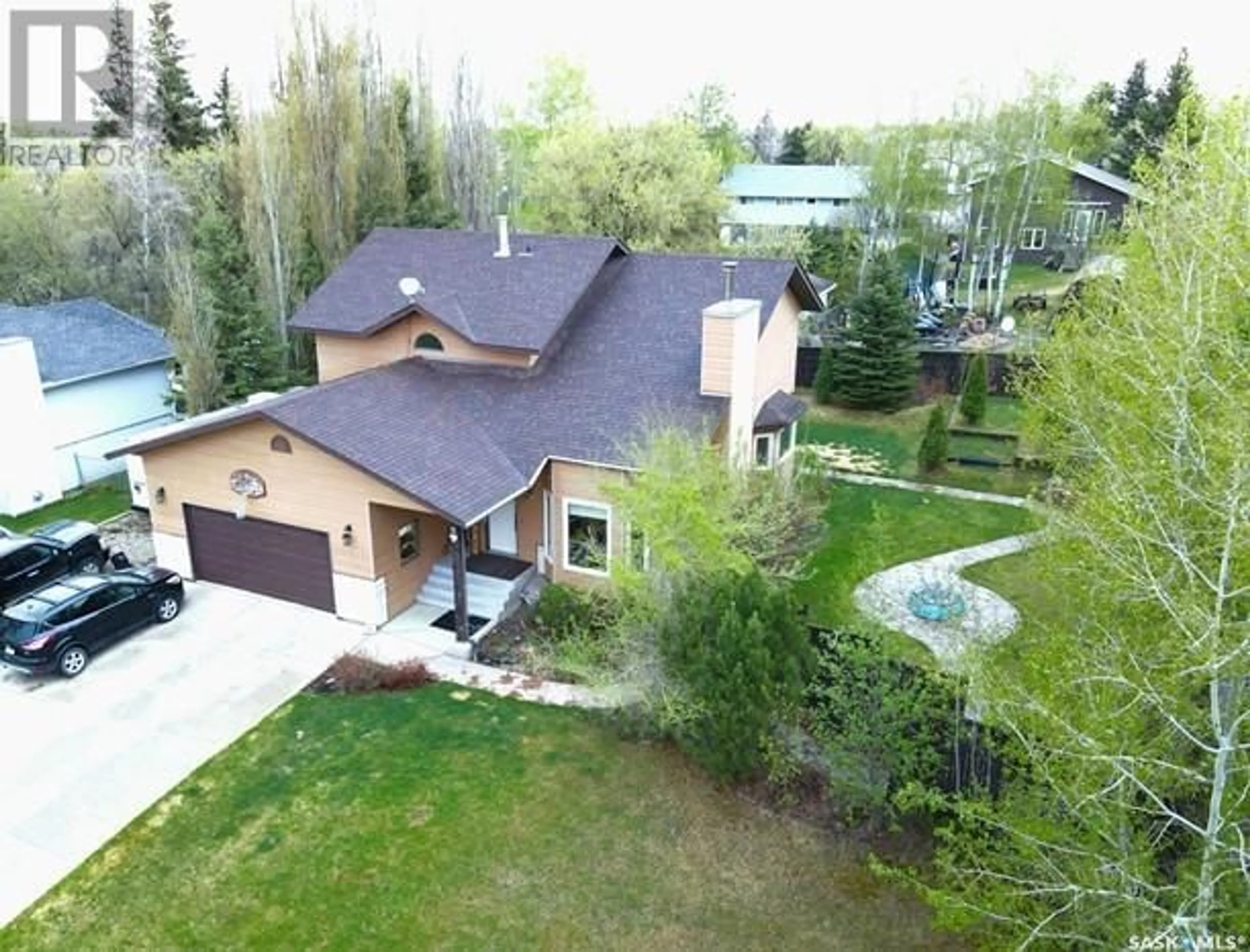 A pic from outside/outdoor area/front of a property/back of a property/a pic from drone, street for 10 CHARPENTIER PLACE, Meadow Lake Saskatchewan S9X1E2