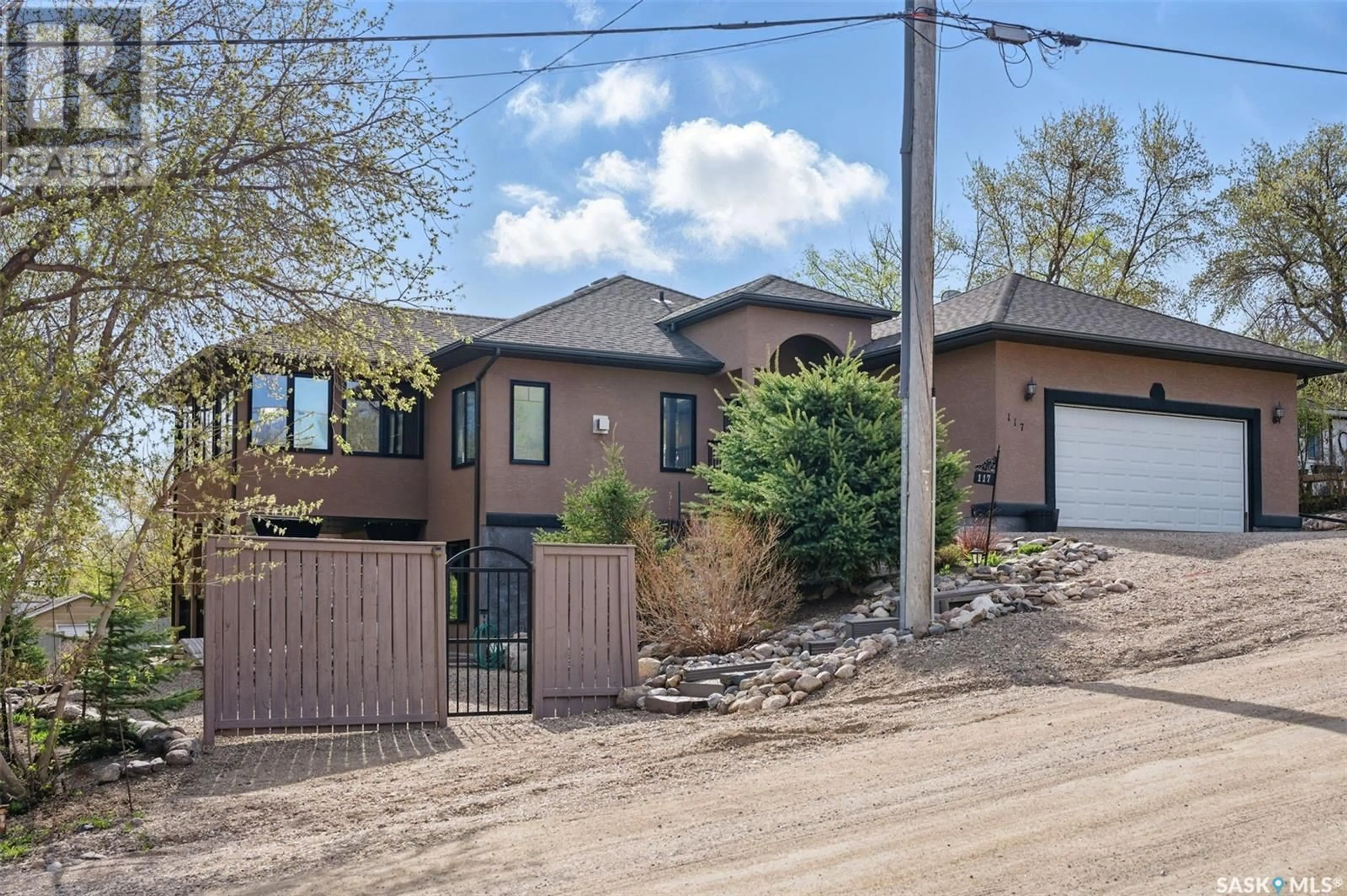 Home with brick exterior material, street for 117 ROY STREET, Manitou Beach Saskatchewan S0K4T1