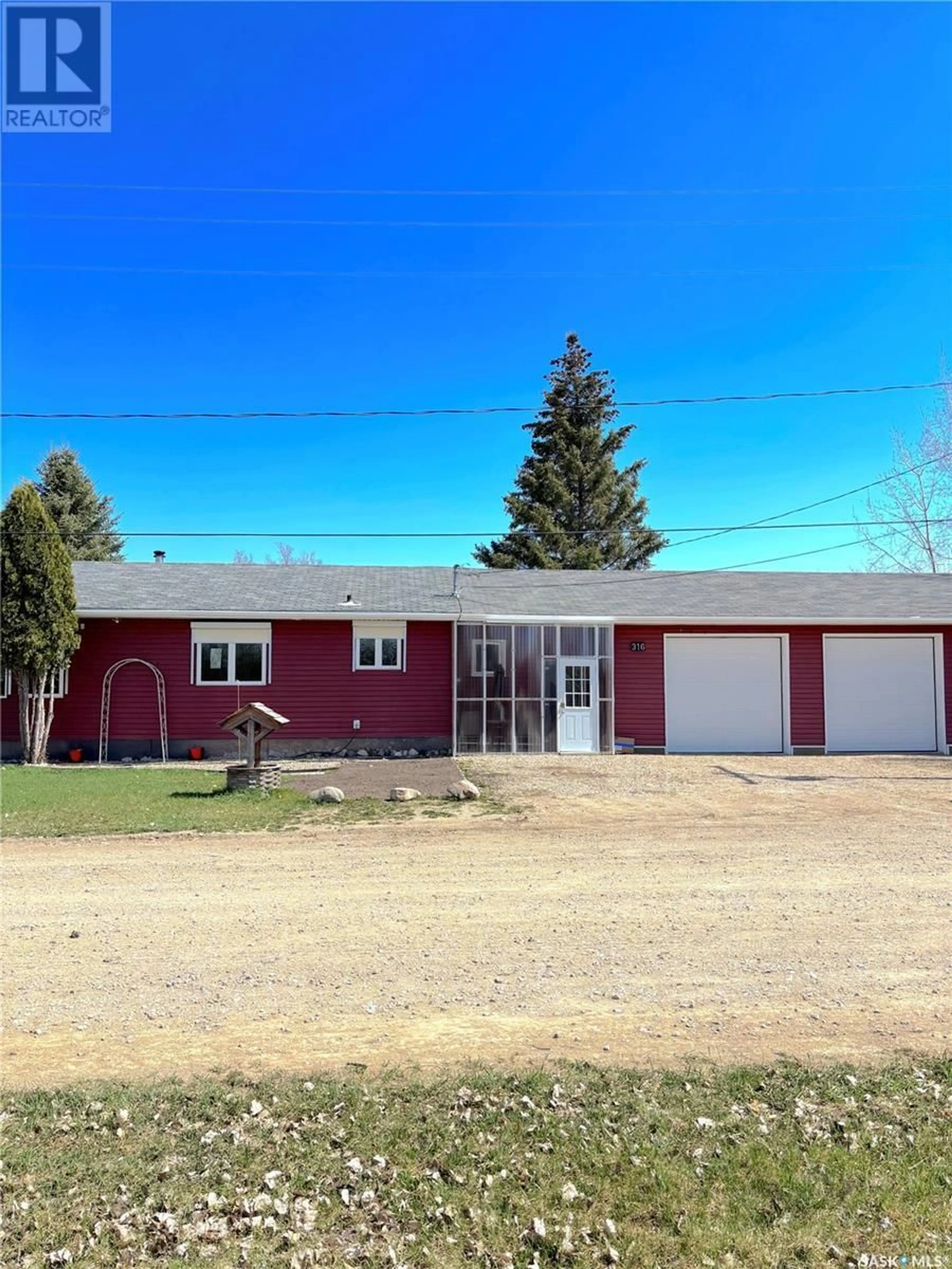 Home with vinyl exterior material, street for 316 3RD AVENUE, Meacham Saskatchewan S0K2V0