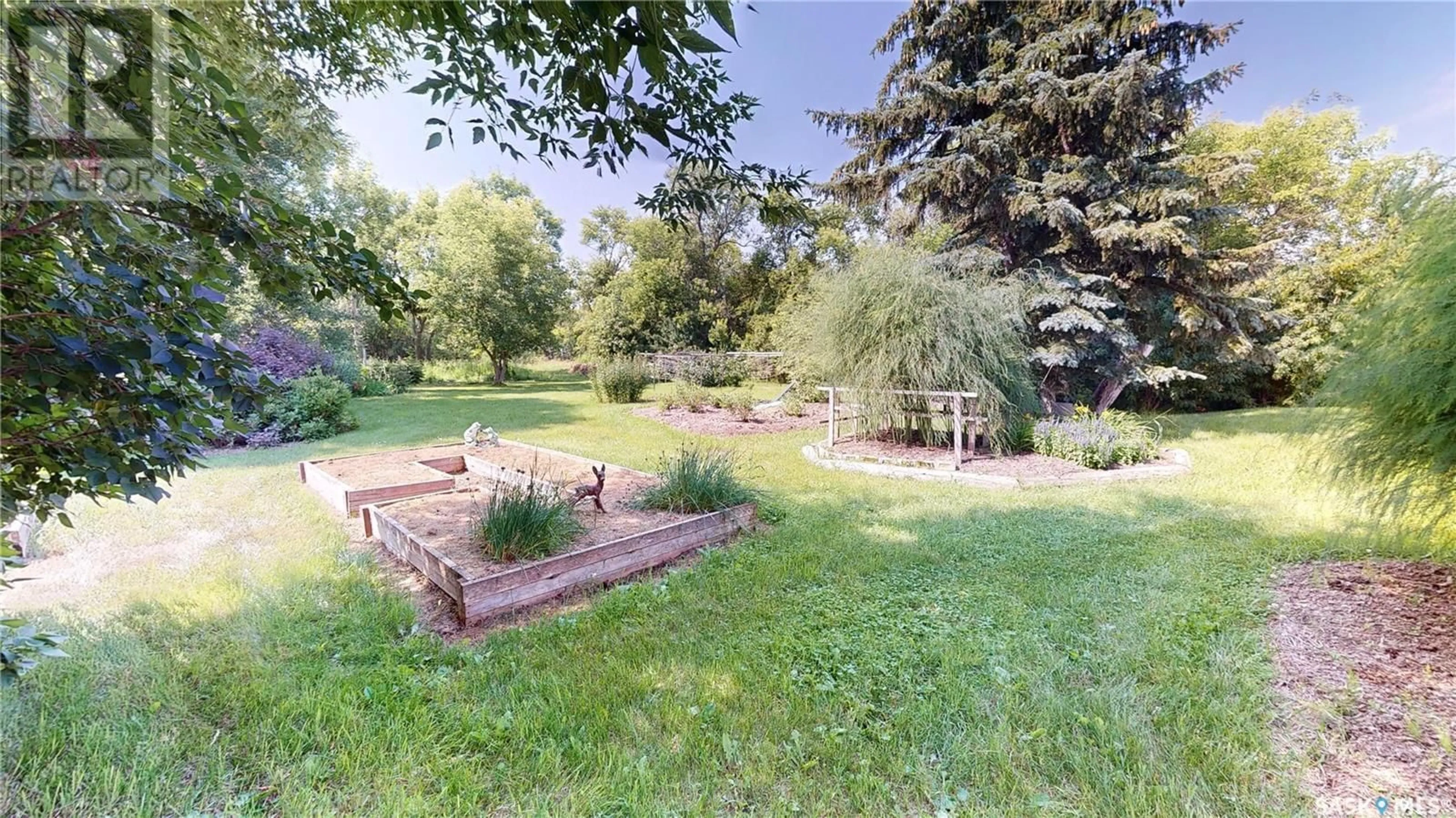 A pic from outside/outdoor area/front of a property/back of a property/a pic from drone, forest/trees view for 180 STEWART STREET, Kisbey Saskatchewan S0C1L0