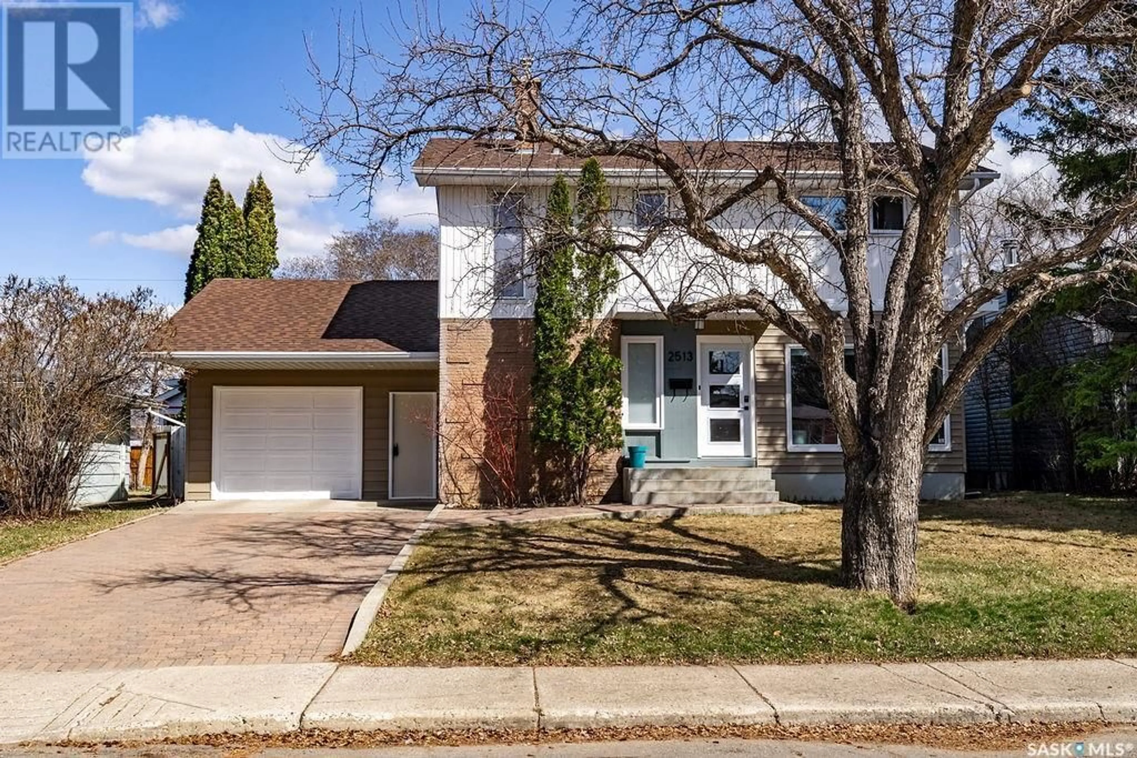 Home with brick exterior material, street for 2513 EWART AVENUE, Saskatoon Saskatchewan S7J1Y7
