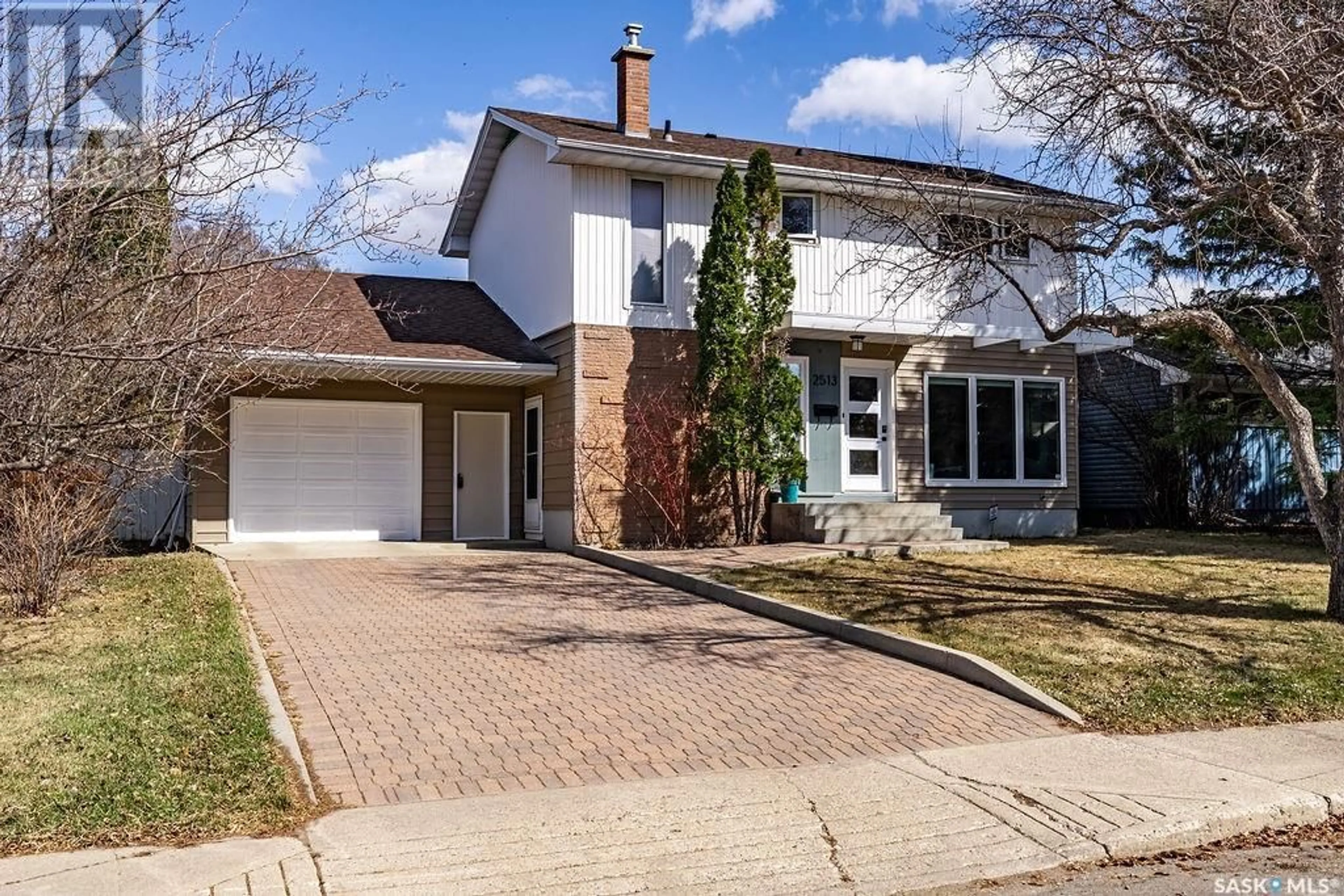Home with brick exterior material, street for 2513 EWART AVENUE, Saskatoon Saskatchewan S7J1Y7