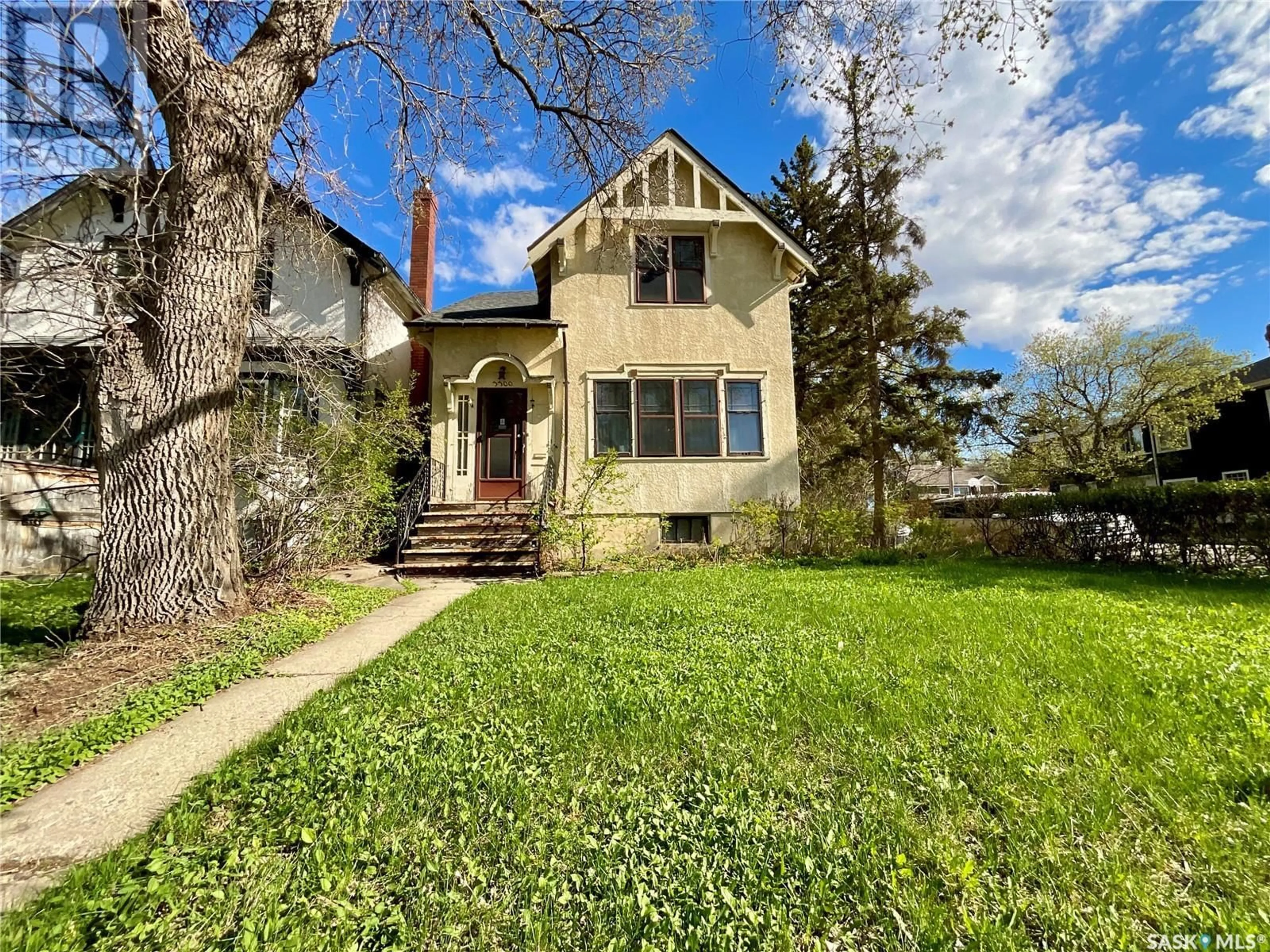 A pic from outside/outdoor area/front of a property/back of a property/a pic from drone, street for 3300 COLLEGE AVENUE, Regina Saskatchewan S4T1W2