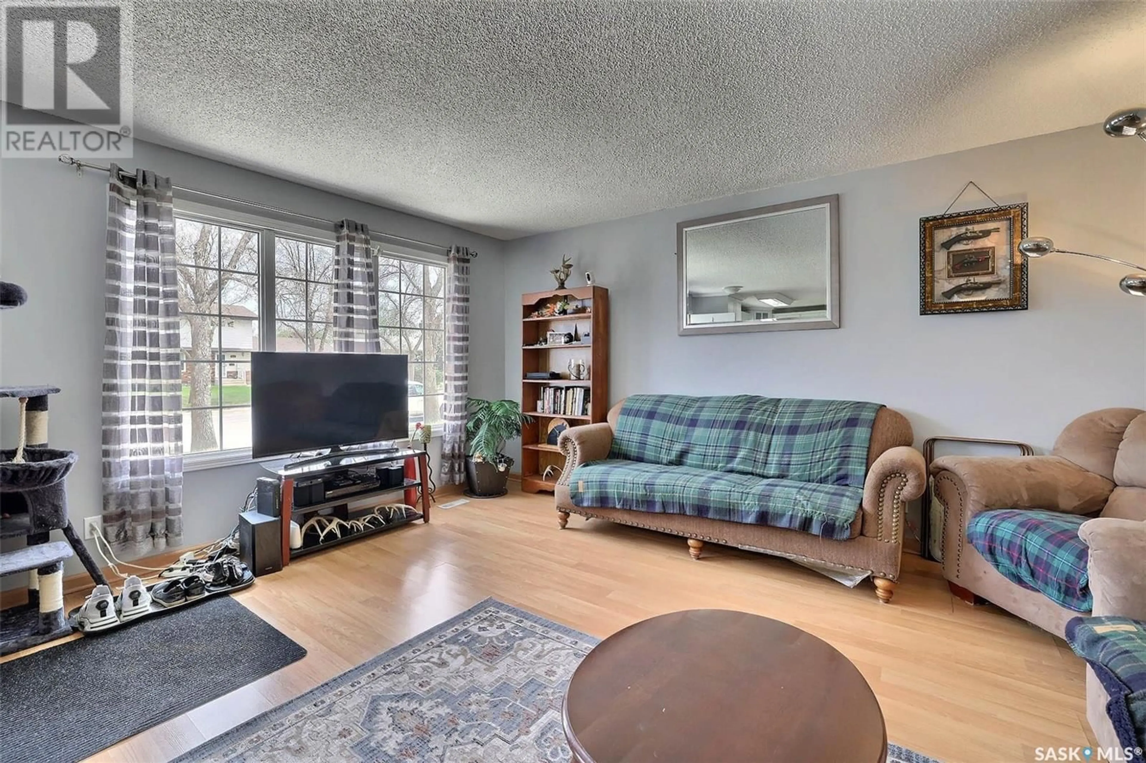 Living room with furniture, unknown for 6406 7TH AVENUE, Regina Saskatchewan S4T7K7
