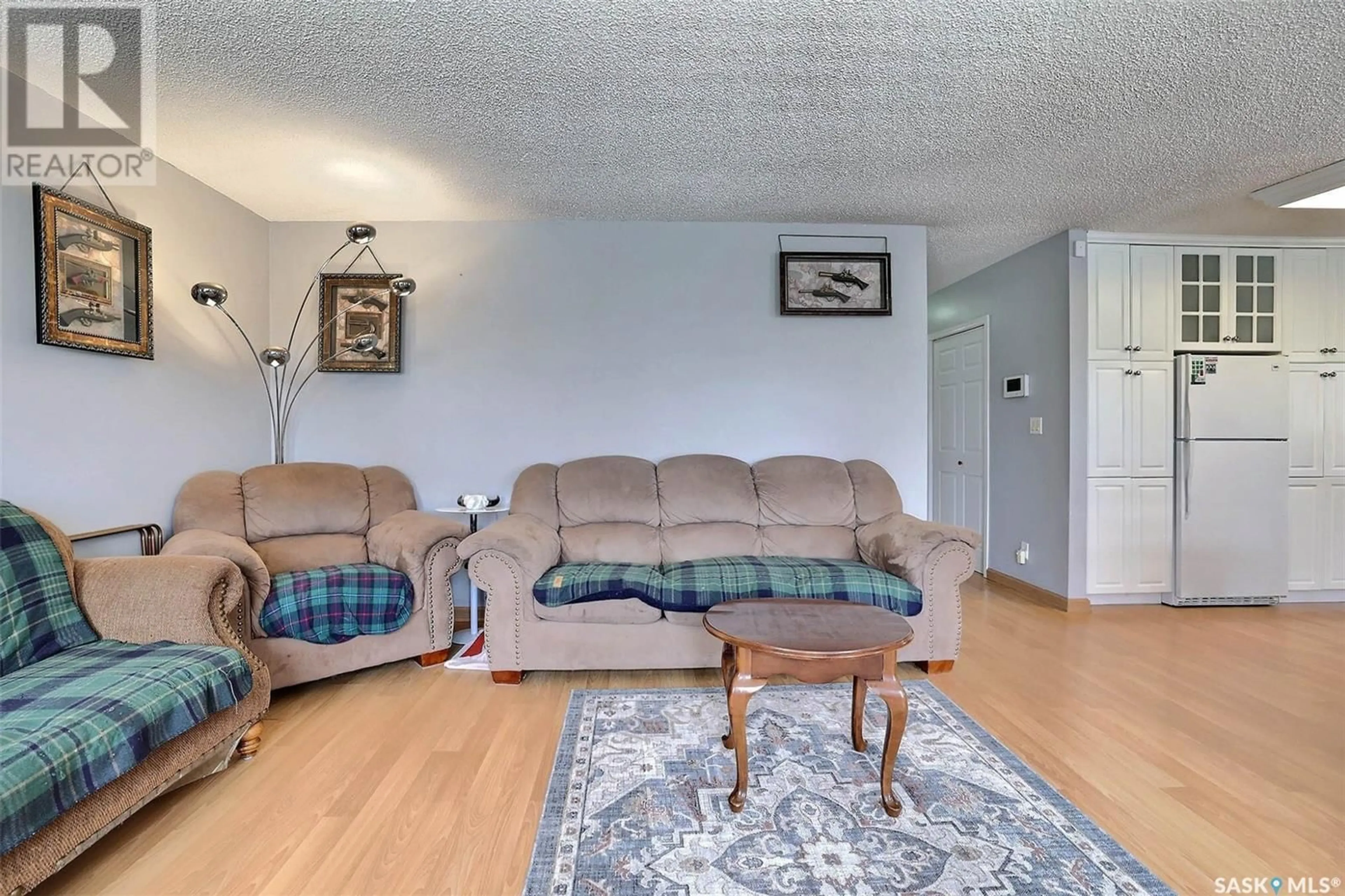 Living room with furniture, unknown for 6406 7TH AVENUE, Regina Saskatchewan S4T7K7