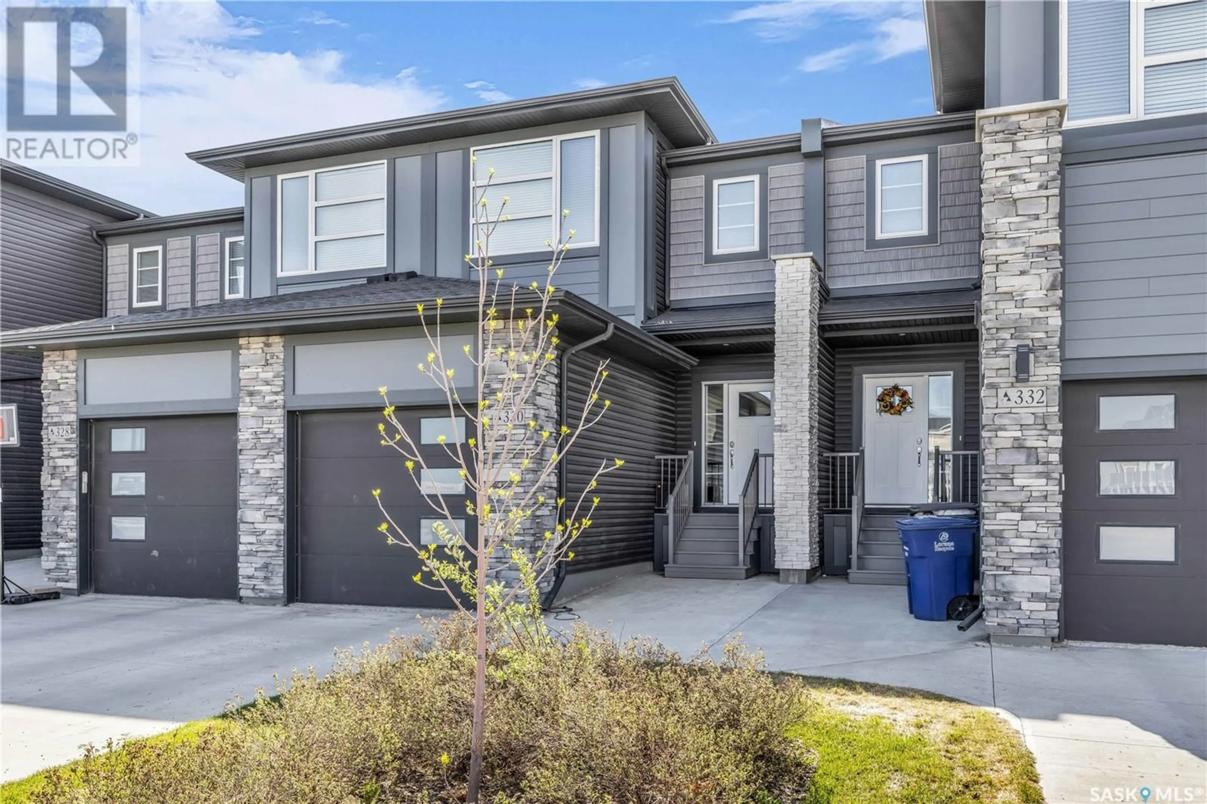 Home with brick exterior material, street for 330 BRIGHTON GATE, Saskatoon Saskatchewan S7V0V5