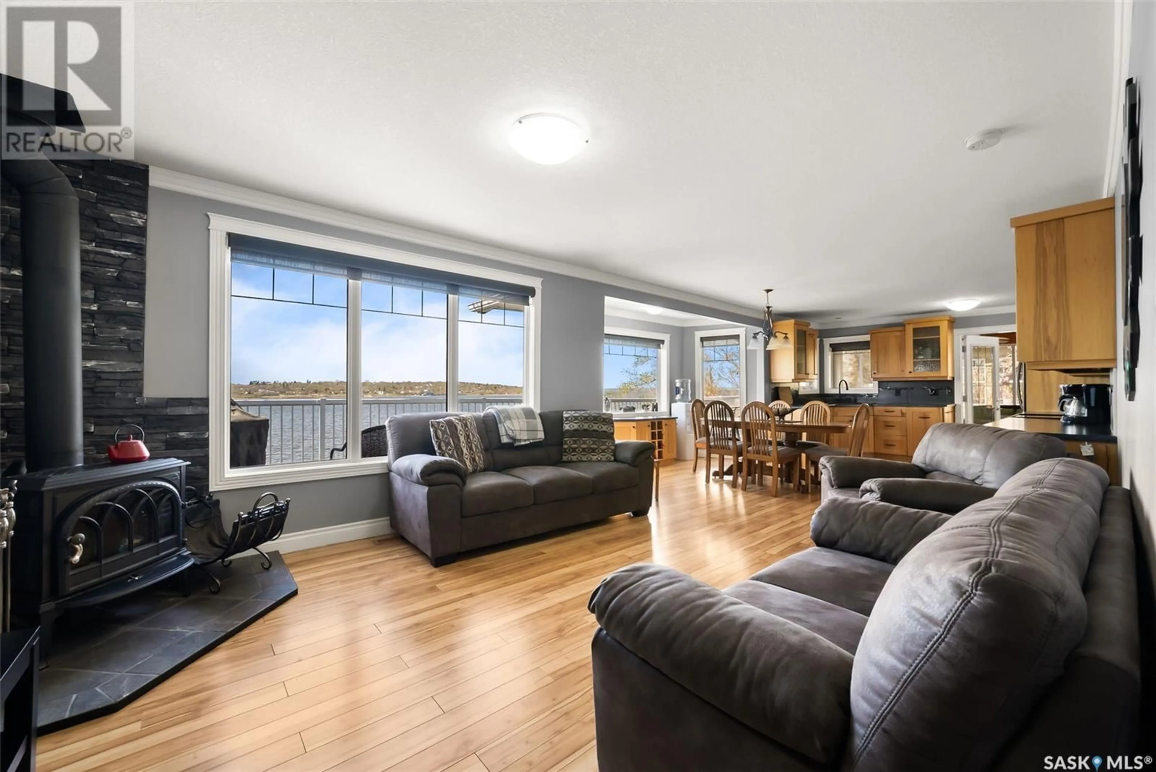 Living room with furniture, wood/laminate floor for 224 PICKEREL STREET, Mckillop Rm No. 220 Saskatchewan S0G4L0