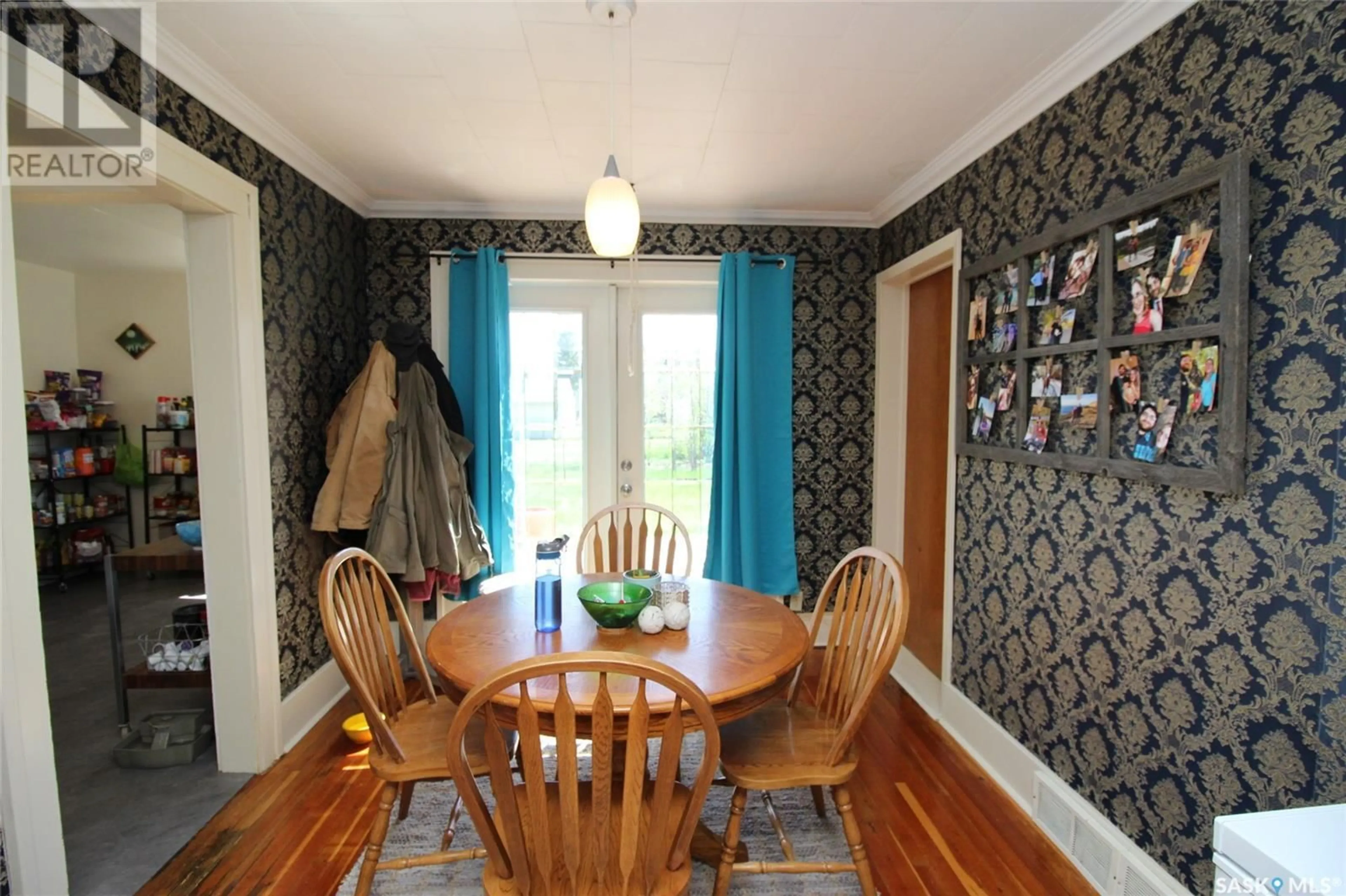 Dining room, wood/laminate floor for 223 1ST AVENUE, Frontier Saskatchewan S0N0A2