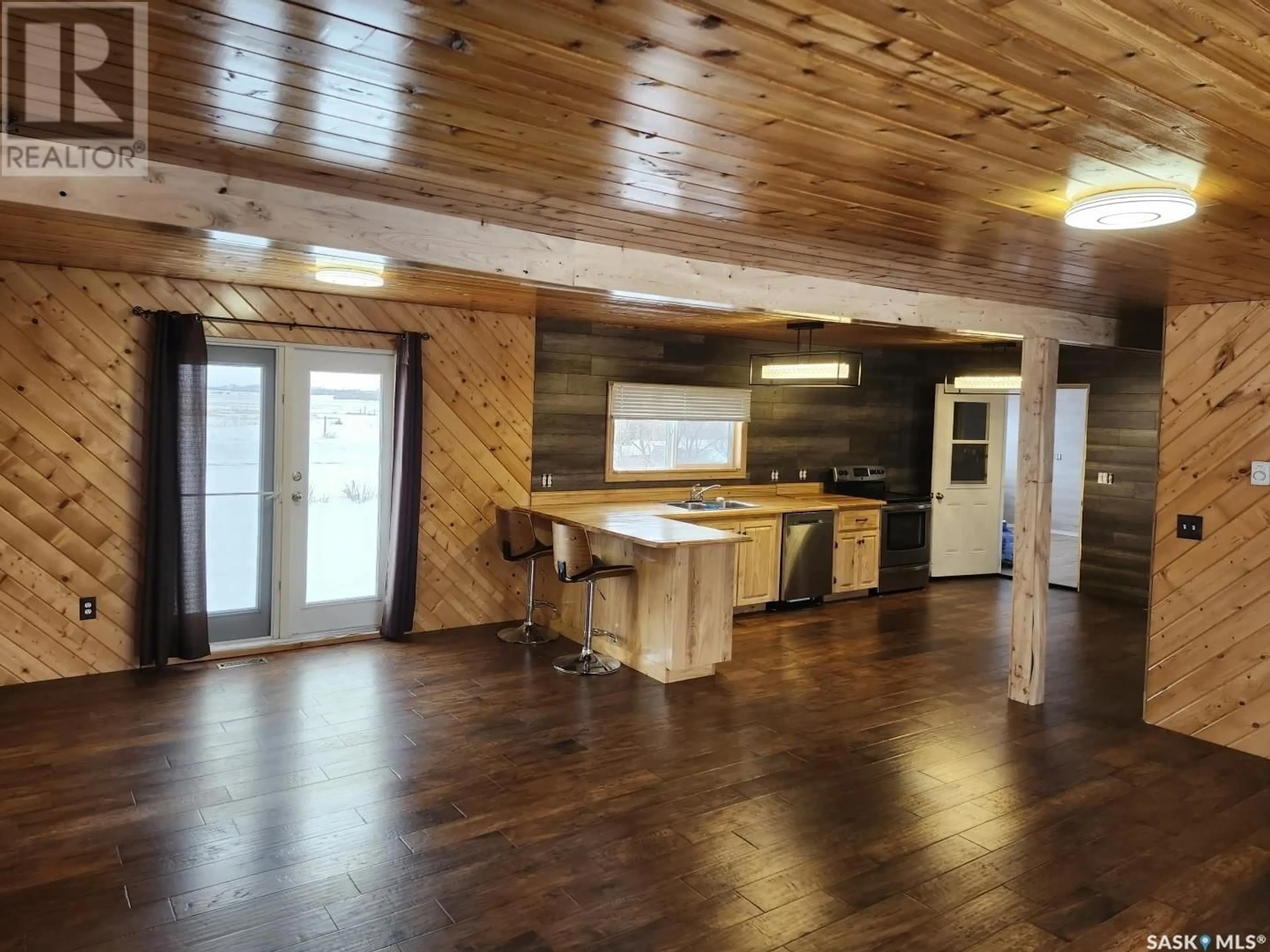 Open concept kitchen, wood/laminate floor for 1 MAIN STREET, Ardath Saskatchewan S0L0B0