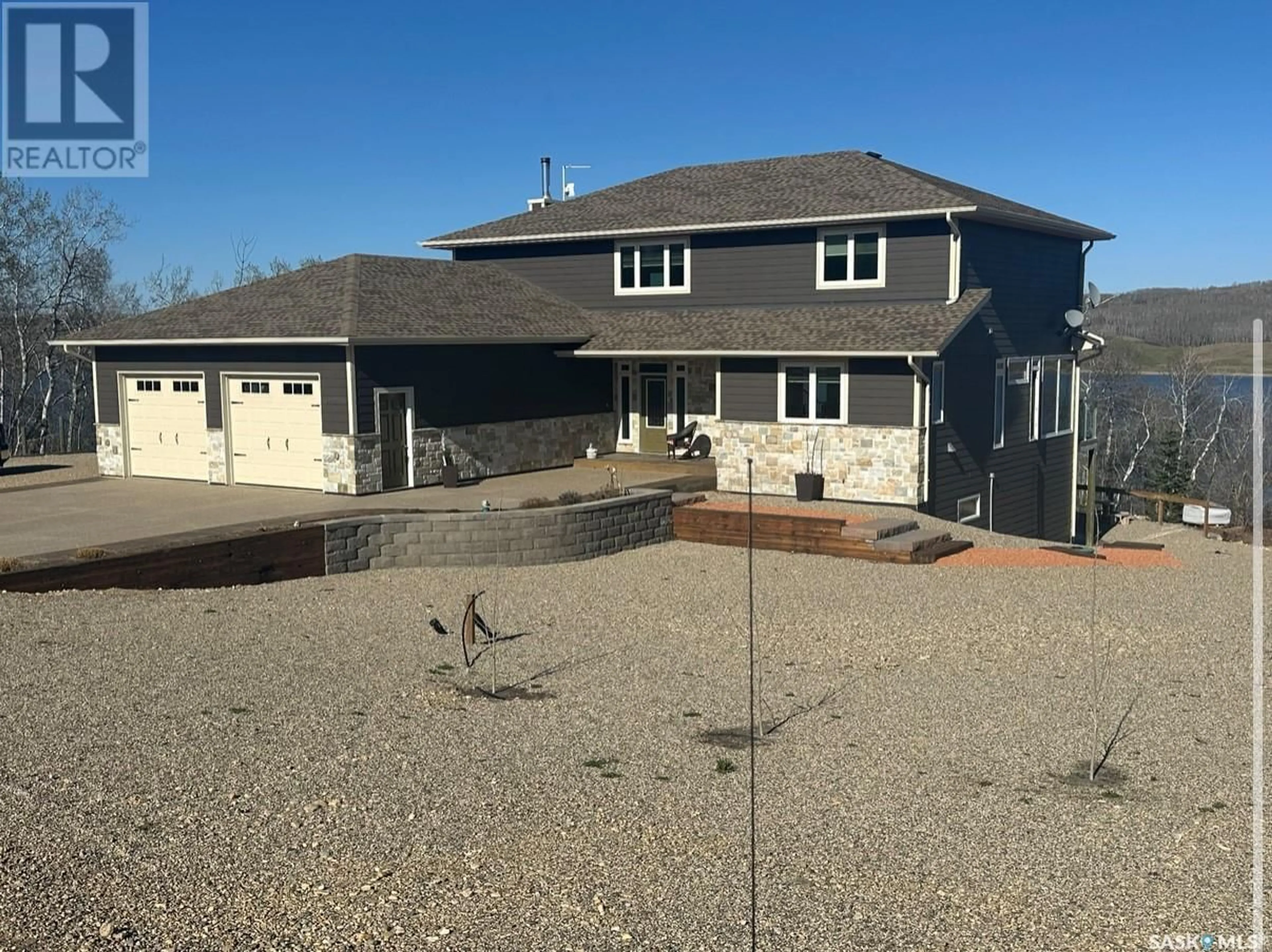 A pic from outside/outdoor area/front of a property/back of a property/a pic from drone, unknown for 40-41-42 KEPULA LANE, Calder Rm No. 241 Saskatchewan S0G3N0