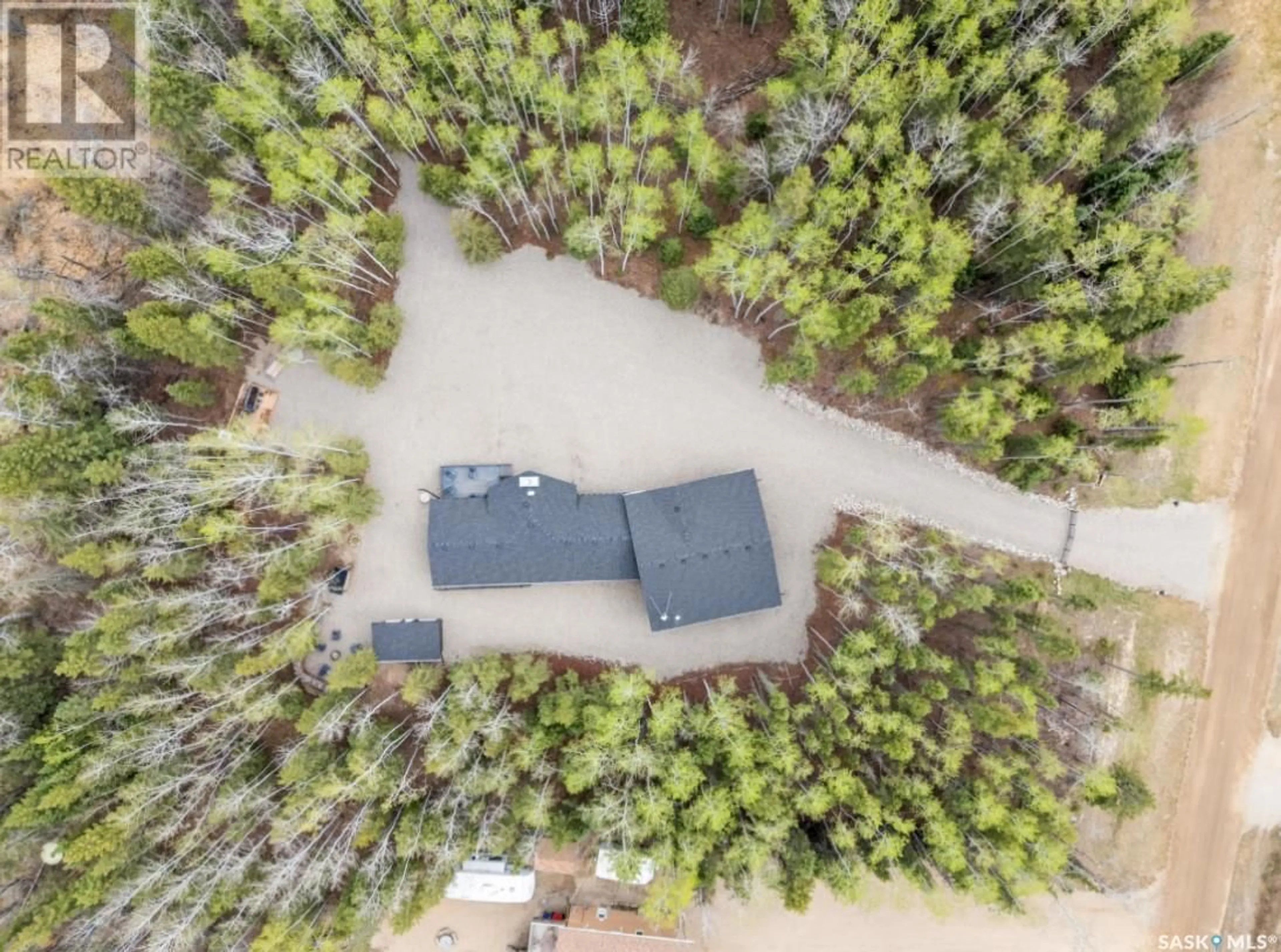 A pic from outside/outdoor area/front of a property/back of a property/a pic from drone, forest/trees view for 306 MEADOW RIDGE DRIVE, Candle Lake Saskatchewan S0J3E0