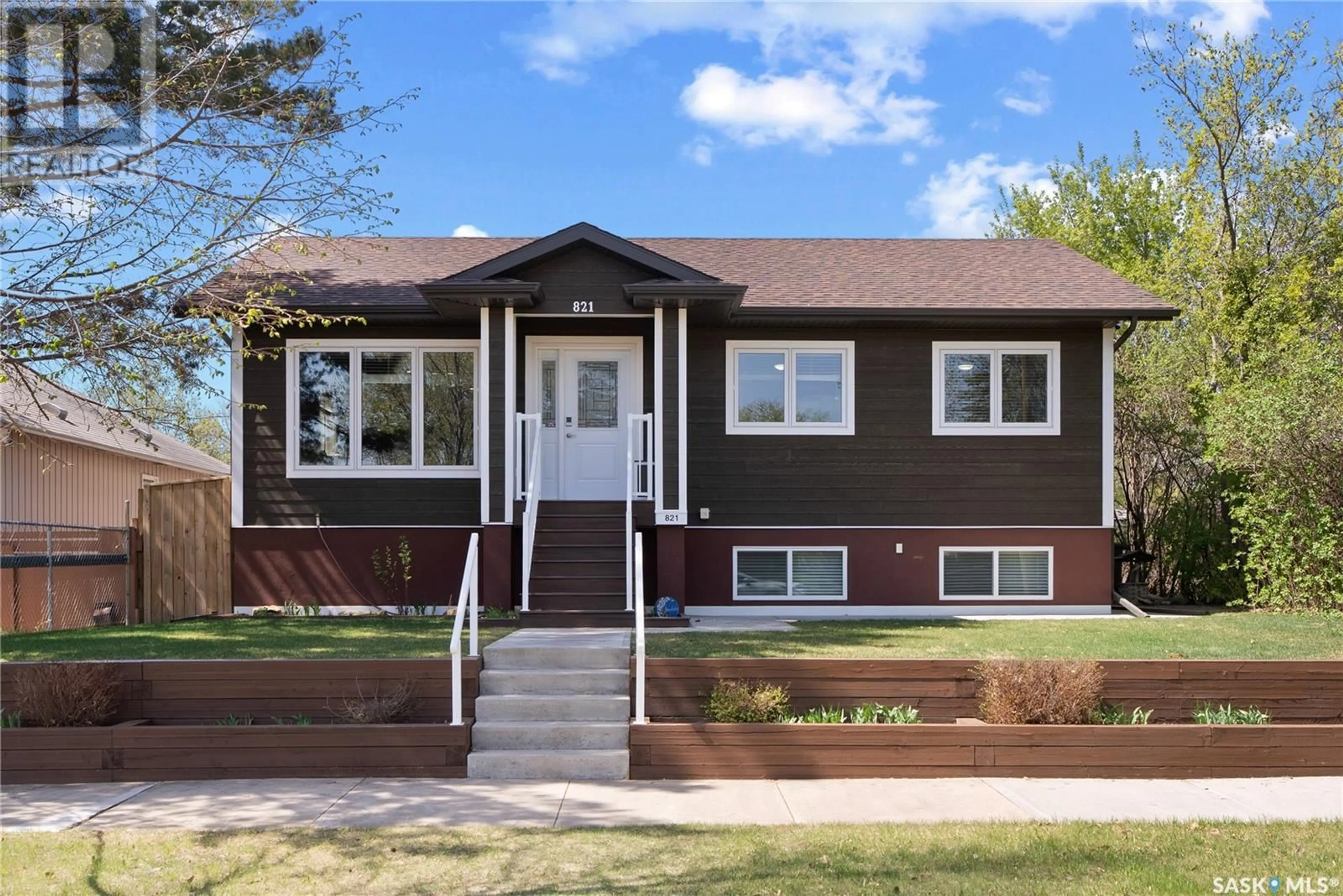 Home with vinyl exterior material, street for 821 100TH STREET, North Battleford Saskatchewan S9A0T8