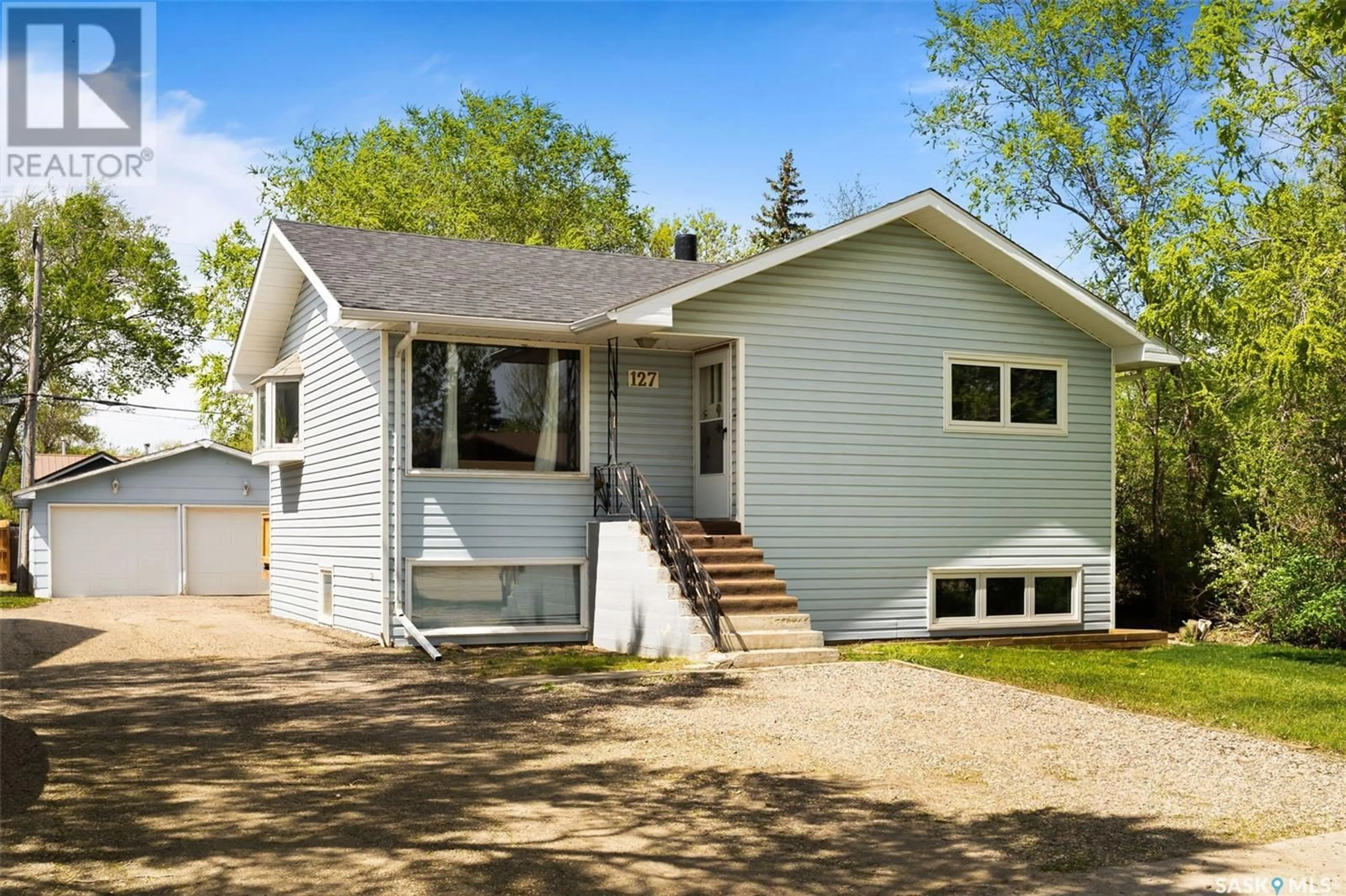 Home with vinyl exterior material, street for 127 QUEEN STREET, Milestone Saskatchewan S0G3L0