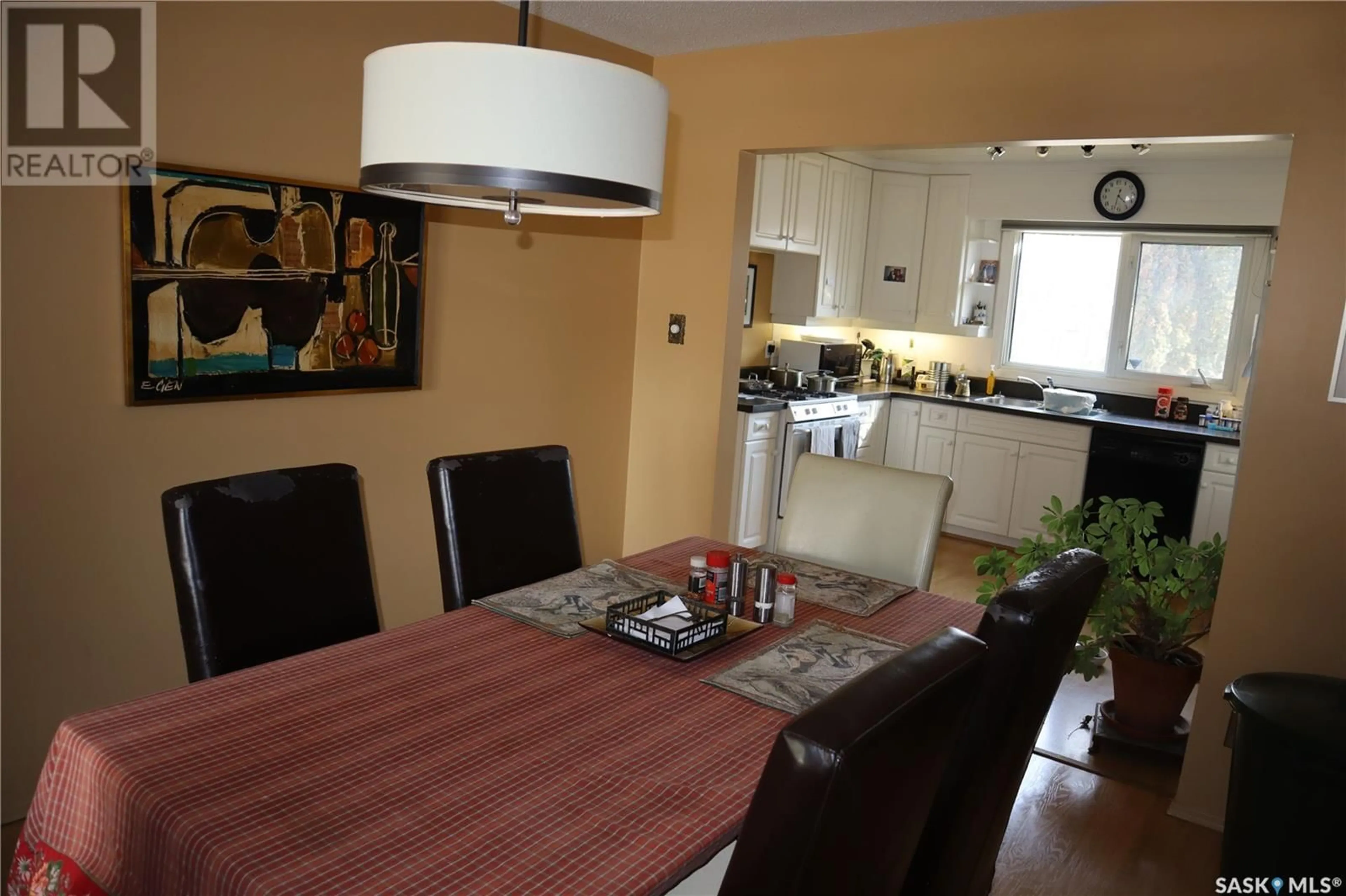 Dining room, wood/laminate floor for 66 RIEL CRESCENT, Saskatoon Saskatchewan S7J2W6